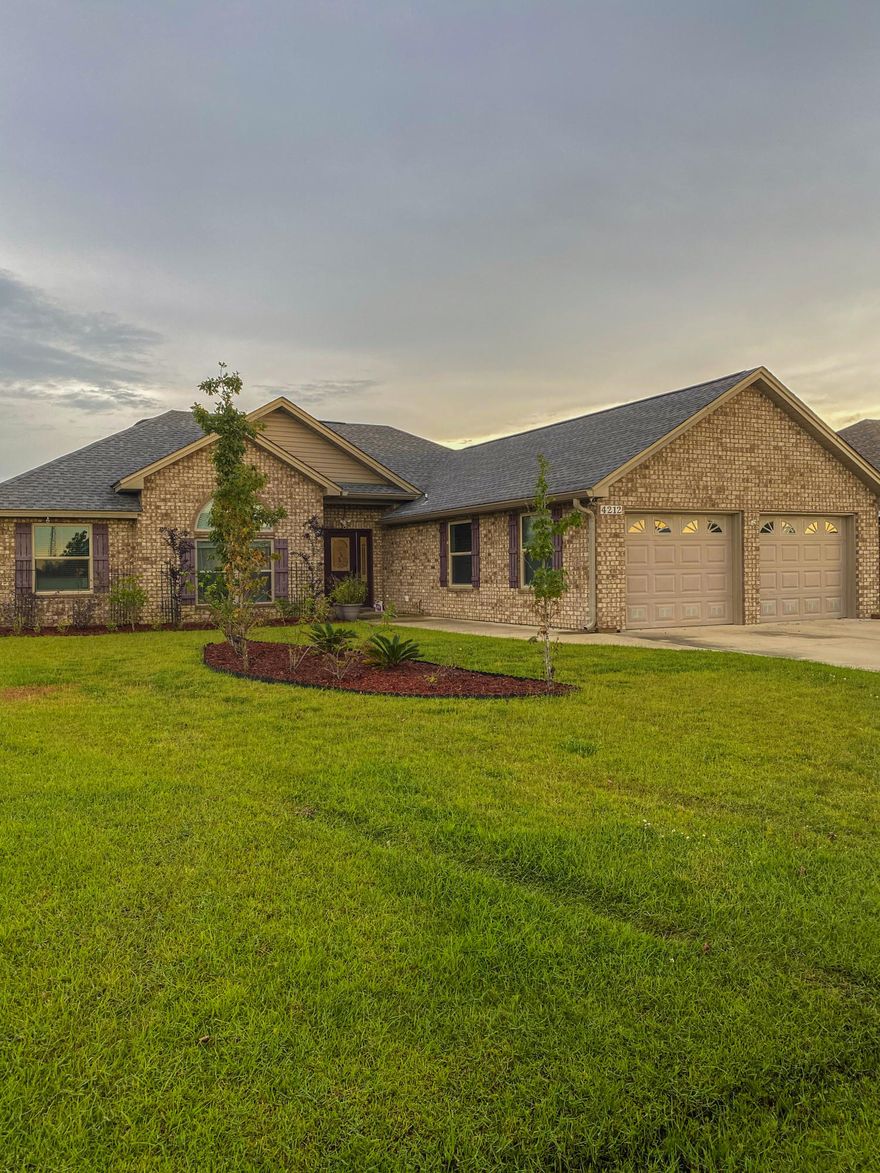 Welcome home - you're going to fall in love as soon as you walk through the front door! Located in a nice up-and-coming neighborhood, this beauty features an ALL BRICK exterior, split floor plan, and a gorgeous kitchen with real wood cabinets, granite countertops, and stainless steel appliances! The master suite is a homeowner's DREAM featuring a double shower with THREE shower heads and bench seating! Lounge in your living room in front of the electric fireplace, and enjoy your family meals in the formal dining area! With everything this home has to offer, you'd be hard pressed to find anything NOT to love about it! Call your favorite agent today for a quick and easy showing!