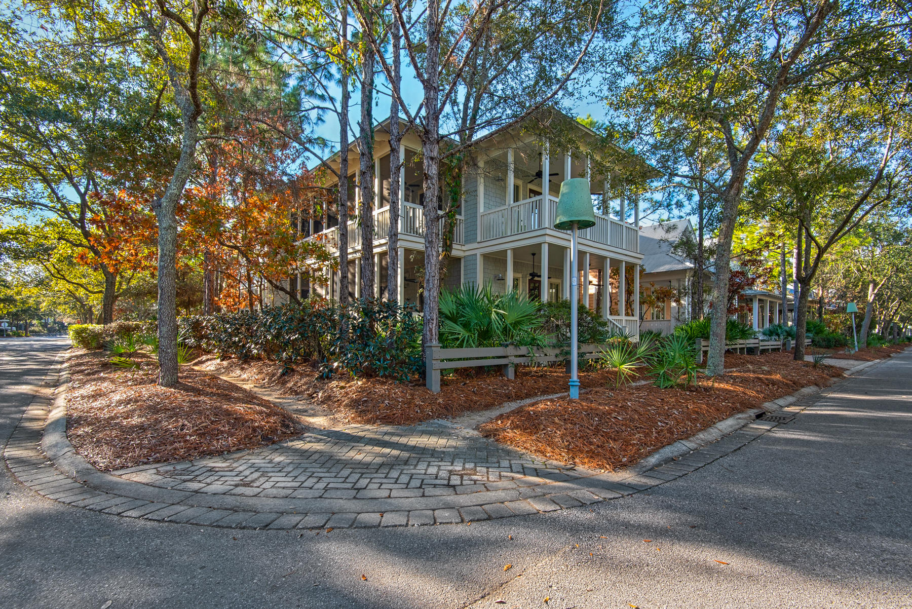 Set on a corner lot in Watercolor's Camp District, this recently renovated 4 bedroom, 4 bath home with a 1 bedroom/1 bath carriage house is the perfect spot to enjoy life along 30A. Just steps away from the beautiful and expanded Camp Watercolor, your family can spend your afternoon floating in the lazy river, swimming in the pools or eating lunch at the canteen bar. The bright & well appointed home features an open concept floor plan, a newly renovated kitchen with large center island to gather and entertain, wide plank walnut floors, beautiful appointed furniture, modern dining globe chandelier, and many other upgrades. Screened porches that run the length of the house on both floors provide lots of indoor/outdoor living space for everyone to relax.The beauty, simplicity and ease