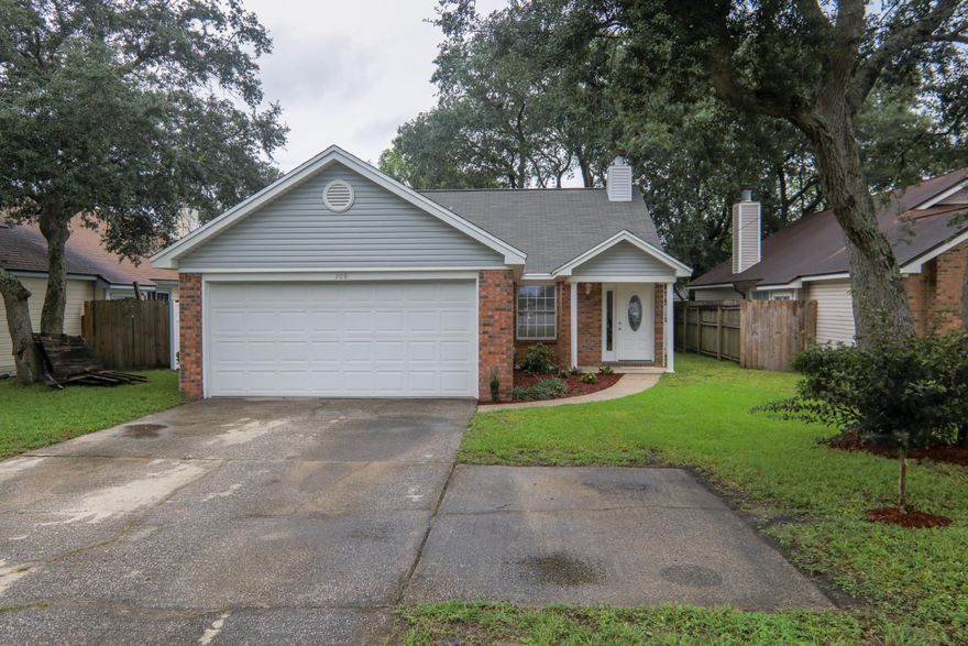 Feast your eyes on this BEAUTIFUL and completely updated home in the heart of Fort Walton Beach! Numerous updates have been done to this home which include NEW appliances, flooring, blinds, paint, light fixtures, and AC unit. Also, all popcorn has been removed from the ceilings! This home has numerous unique features that make it stand out amongst the rest. Pulling up to the home, you will notice the extra parking to the side of the driveway. A few other unique features include a lovely open floor plan in the main living areas and a comforting fireplace nestled in the living room. Because of this floor plan, you can easily converse with guests seated in the dining room or living room while you prepare meals in the kitchen.