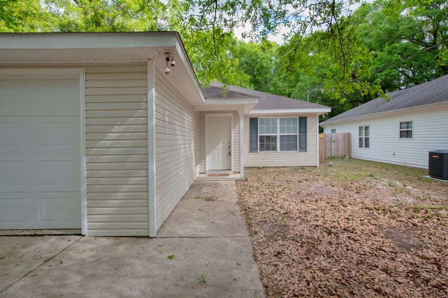 Charming home in the heart of Crestview. South of Hwy 90, it's a quick drive to I-10 or south on 85 to Duke, Eglin or Fort Walton Beach. This open concept home still has privacy with it's split floorplan design. Lots of storage with multiple closets and a pantry in the kitchen. Speaking of the kitchen you have lots of storage options and plenty of cook space. Add some bar stools to the counter for a quick bite or have a nice sit down dinner in the large dining area. Don't let the square footage fool you, there is plenty of space for gatherings inside and out! Don't miss the expanded paver patio in the fully fenced backyard. Plus the backyard is big enough for a pool!