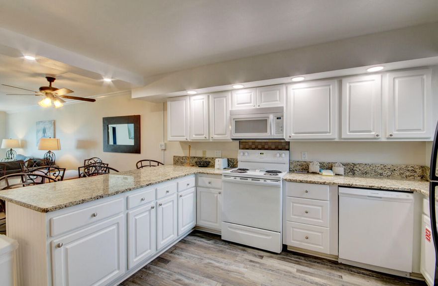 What is the first thing you think of when you're  looking for your Ideal beach home. The BEACH of course. Well look  no further... This  beautiful first floor two bedroom two bath Condo is going to check all of the boxes. This condo has been renovated throughout. You will find new cabinetry and new granite in the kitchen recess lighting. This kitchen is fully furnished with everything you need to make wonderful meals to be served in the dining room or to be taken on patio, while watching people walk the short distance to the beach. Both bathrooms have been renovated. You will find the interior to be inviting and bright everything that you would expect in a oceanfront getaway that will make you want to make it your own!!!