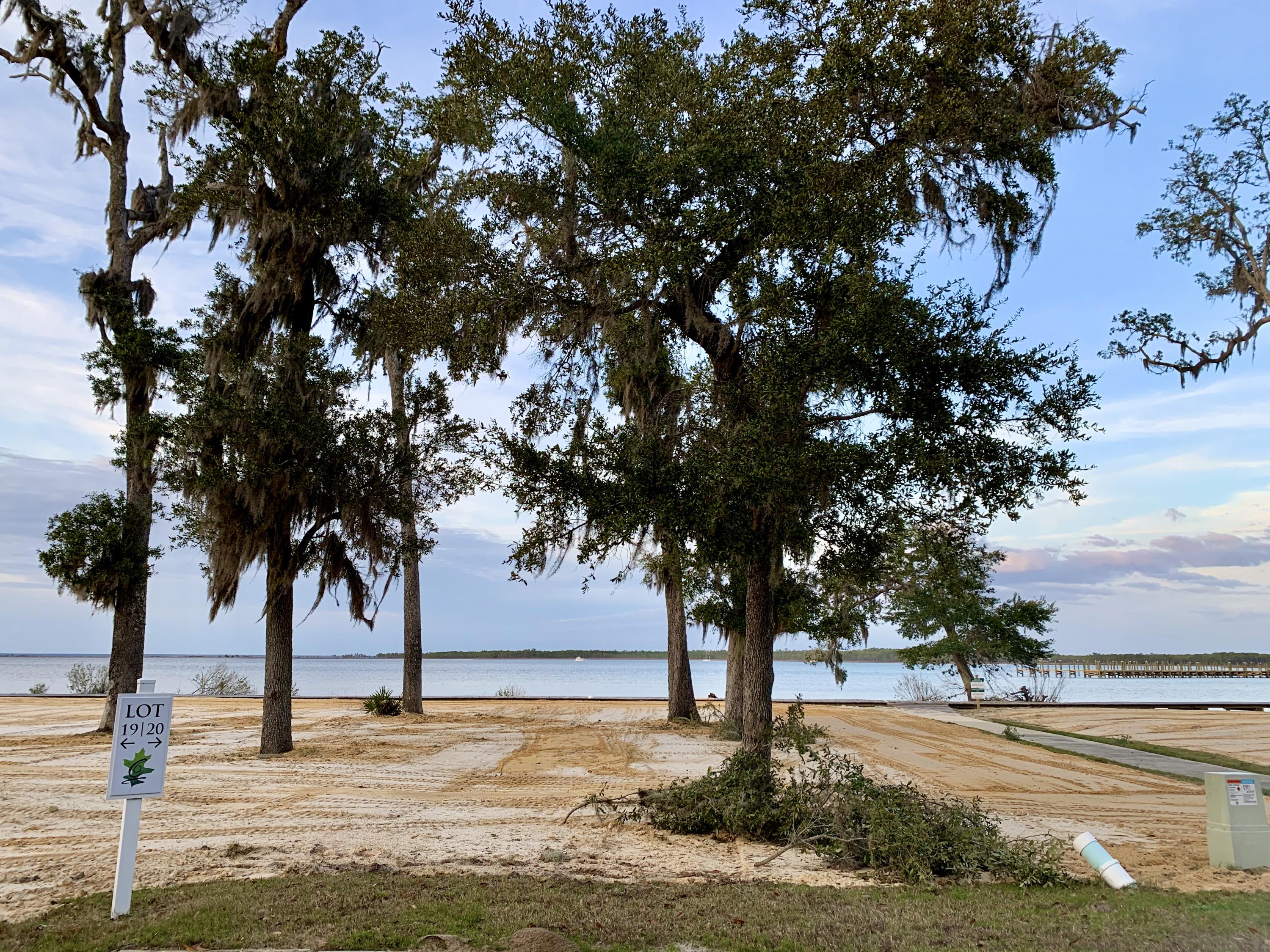 Lot 22 is a premium bay front homesite situated on a quiet cul-de-sac and tucked away with only native vegetation and the calm waters of Hogtown Bayou in sight. Churchill Oaks offers a lifestyle of elegance and appreciation of nature. Once inside the stately gated entrance, magnificent coastal homes accentuate southern architecture under a canopy of old oak trees. The 40-acre community is comprised of 87 homesites and some of the best amenities in South Walton including community marina coming in 2020.