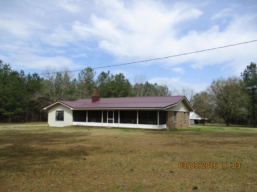 LOOKING FOR YOUR COUNTRY RETREAT AWAY FROM THE HUSTLE AND BUSTLE THIS IS IT. LOCATED JUST 20 MINUTES NORTH OF CRESTVIEW THIS 3 BEDROOM 3 BATH HOME OFFERS EVERYTHING YOU ARE LOOKING FOR. PERFECTLY SITUATED ON 15 ACRES HOME HAS A LARGE KITCHEN, OPEN LIVING ROOM WITH FIREPLACE, 2 ADDITIONAL BEDROOMS WITH A JACK AND JILL BATH, HUGE FULL BATH AND UTILITY ROOM, GREAT MASTER SUITE THAT INCLUDES OFFICE AREA. HOME HAS A WELCOMING FRONT SREENED PORCH, PAVED DRIVEWAY, HUGE WORKSHOP WITH ROLL UP DOOR, GREAT HAY BARN THAT CAN EASILY BE CONVERTED TO INCLUDE HORSE STALLS. PROPERTY OFFERS AN ADDDITIONAL AREA SET UP FOR A RV OR TRAILOR, TIMBER VALUED AT 8K -10K. HOME HAS TONS OF SPACE, WELL MAINTAINED AND MOVE IN READY. CALL TO SEE THIS ONE TODAY!