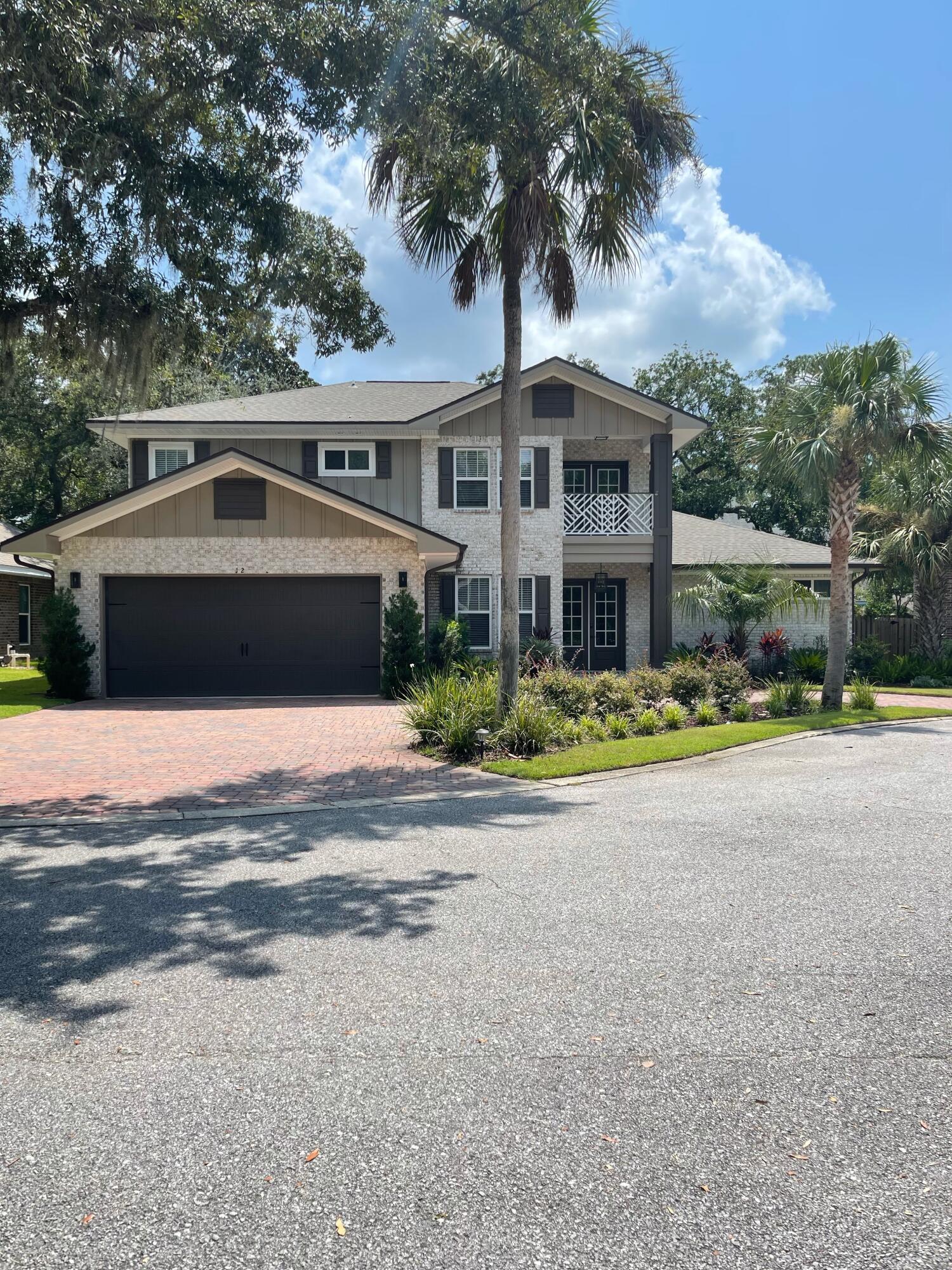 This gorgeous, well-maintained home is located in a beautiful neighborhood in the heart of Mary Esther. Access to Santa Rosa Sound via a boardwalk for the residents of this small neighborhood, too! Property is high and dry - located in Flood Zone X. Double front doors, along with a circular drive make the home's curb appeal spectacular! The large chef's kitchen boasts hard-rock maple cabinetry, granite countertops, a large pantry, wet bar with wine refrigerator, stainless appliances, gas stove with wall oven, and a commercial-grade built in refrigerator. Beautiful wood flooring in main living areas. This 4 bed, 3.5 bath home is spacious, and even has a second living area upstairs. This home is convenient to both bases:Hurlburt Fld is less than 3 miles away and Eglin AFB approximately 8.