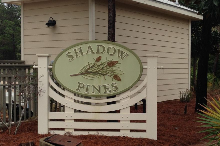 JUST REDUCED $5000. HALF MILE FROM THE BEACH. Located in a small private community with pool, sidewalks, street lights and underground utilities. Nice wooded area with tons of Privacy and nearby beach access.The seller has done all the work, cleared the lot and has approved plans and engineering drawing completed. Gulf Place with its Artists, Music venue, shops and restaurants is just .3 miles away making this lot the perfect lot for your beach home.Buyer to verify all information to buyers satisfaction including but not limited to lot size, zoning etc.