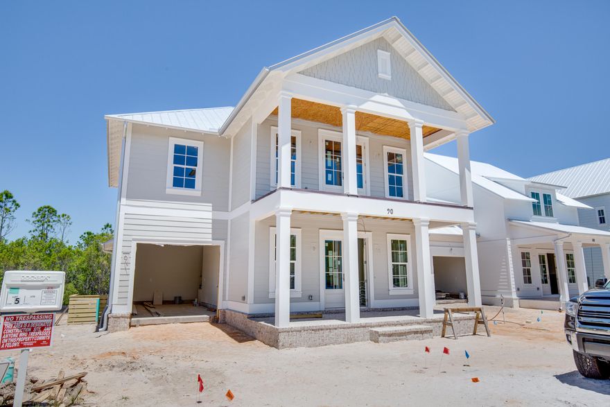 Introducing Cottage Grove, the newest coastal neighborhood south of Hwy 98! The Magnolia plan offers 3 bedrooms, 3.5 baths, attached 1-car garage, and an office.The spacious first floor has 10' ceilings with an open-concept plan including kitchen with large island overlooking living/dining area with built in dry bar & wine cooler. Interior features include stainless steel appliances with 36'' cooktop and vent hood, choice of quartz or granite countertops, shaker style cabinets, crown molding throughout, engineered hardwood flooring with tile in bathroom and laundry. Exterior features include a brick paver driveway, metal roof, irrigation system, French style gas lantern, and brick & fiber cement siding with 2x6 exterior framing. The Cottage Grove neighborhood includes a