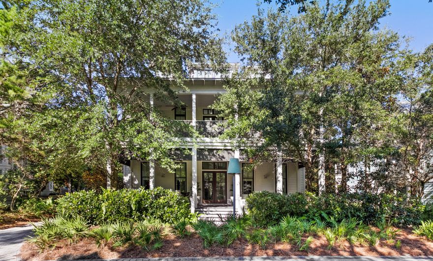 This timeless beauty-designed in collaboration by Roger Godwin (DAG) & T. S. Adams, with interiors by Dale Trice-is tucked away in Phase I and has everything you want in a classic, elegant beach home.  With over 5000 sq ft and another 2000 sq ft in porches alone, there is ample room for enjoyment. The custom window treatments, cabinetry, upholstery and finishes exude an understated elegance found only in true luxury properties. Enter the front door to a foyer with polished travertine tile flooring and a sweeping staircase.  The first floor features three ensuite bedrooms and a sizable living area that opens onto a large porch overlooking the pool and outdoor fireplace.  For ease in entertaining, there are a wet bar and powder room on the first floor.