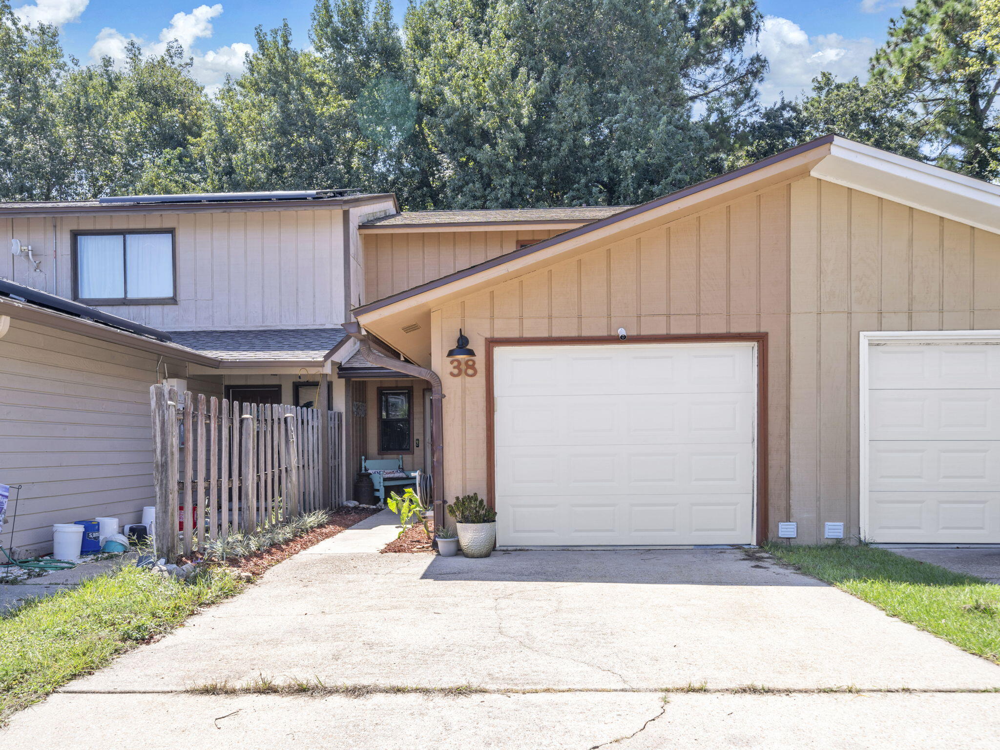 NEW: ROOF, HVAC, HWH & NEWER PLUMBING provide peace of mind! ..& SINGLE CAR-GARAGE set this townhome aside! The large kitchen w/new counters, newer white cabinets & eating bar flows effortlessly into the spacious living & dining areas w/newer LVP flooring. Whether it's a morning coffee or an evening aperitif, the cozy, screened porch provides the ideal space for relaxation. Two LARGE, BR's w/ample walk-in closets provide privacy & plenty of space for a work area if needed. Other features include a remodeled half bath, newer garage door, new fence and NO HOA! An ideal space for relaxing or entertaining, you'll love the fenced, private backyard w/large patio! Located in the heart of FWB, both bases, schools & shopping are close by. Act now, as this cozy home w/GARAGE won't last long.