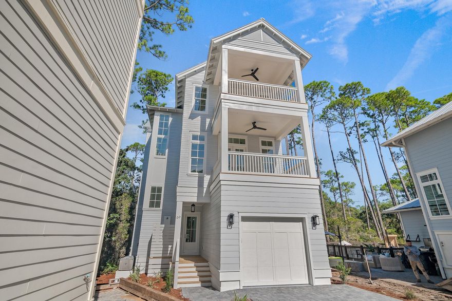 Construction Just Completed!!Start 2025 in this brand new construction home. Nestled  between the idyllic neighborhoods of Rosemary Beach and Seacrest  in the gated community of Treetop Village.  Boasting stainless steel appliances, luxury vinyl plank flooring and custom cabinetry this is the perfect coastal retreat for your family for years to come.  Treetop offers the unique ability to exit straight onto Hwy. 98 or exit to the South into Seacrest and onto Hwy. 30A. The Seacrest Tram  conveniently offers service to the the sugar sand beaches and community pool. With two  master suites, a spacious bunk room,  and fabulous outdoor entertaining spaces. A spacious deck overlooks the natural preserve. This will be the perfect spot to create memories with family and friends for years to come