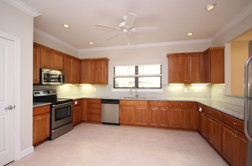 Move-in ready home in much desired Sandestin Golf and Beach Resort's Deerwood neighborhood. Situated on a corner lot, this is one of the largest lots in Deerwood! This huge kitchen has recently been remodeled including cabinets, granite countertops, undermounted sink, garbage disposal, subway tile backsplash, appliances, and lighting. In addition, the entire home has just been repainted and has new carpet. Other features include a gas fireplace, Florida room, 2 car garage, patio and large fenced in backyard with more privacy than most Deerwood homes offer. All this comfortably contained in a single level home. Deerwood is a rental restricted neighborhood and does not allow short-term rentals. Buyer to verify all dimensions and assessment fees.