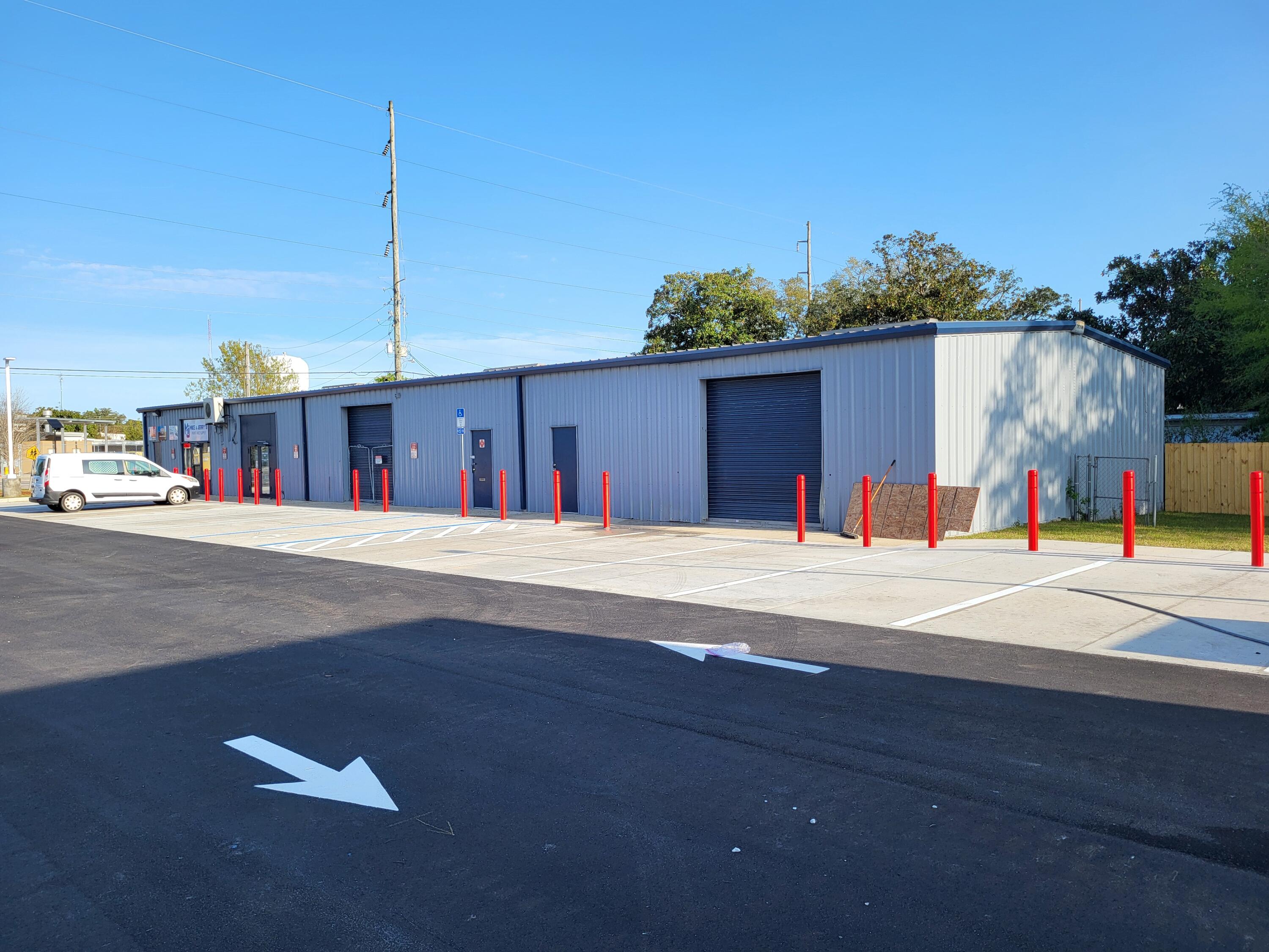 Warehouse next to new Circle-K and Pryor Middle School. Brand new asphalt parking lot. 1 restroom, 1 office but needs remodeled. 10'x10' roll up door.  Stop light intersection.