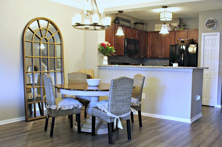 Ideally located between Panama City & Lynn Haven, this well-maintained and UPDATED townhome is a must see. 3 bedroom, 2.5 Bath located in the quiet gated community of Baldwin Rowe Townhomes. Unit faces the community stocked pond with water feature & providing a serene view as you enjoy your morning coffee from the screened in back porch. One of the few units to enjoy SUNSET & SUNRISE views!! To be Included in sale: ALL new appliances in kitchen along with front-loading washer and dryer. UPDATES INCLUDE: luxury Vinyl flooring added throughout, new carpet on stairs, painted interior, new lighting in kitchen & dining, downstairs bathroom sink & mirror, new granite countertops in kitchen, tile backsplash, deep sink with faucet and garbage disposal.