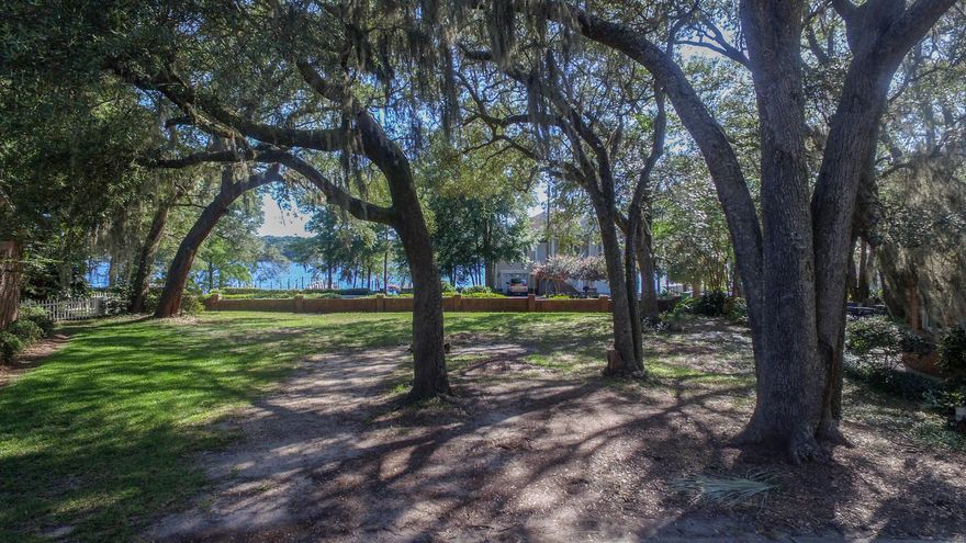 Spectacular homesite in Grand Oaks! This is the last homesite in the neighborhood that has a direct view of the bayou. Build your dream home right here under the majestic oaks in this unique neighborhood.