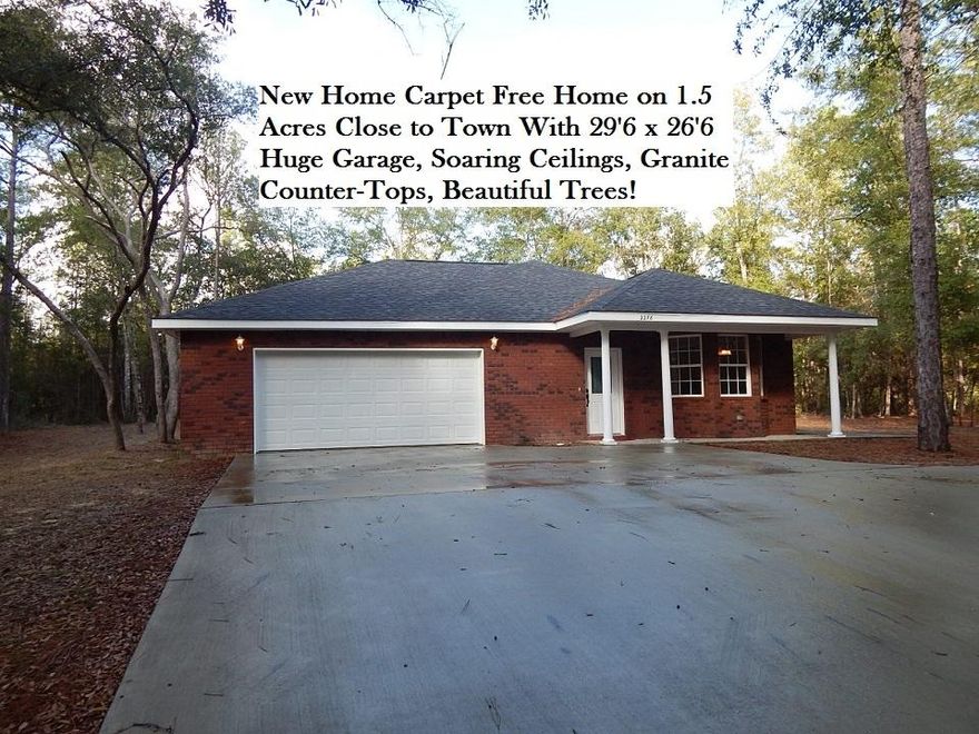 Looking for Some Elbow Room Away From the Neighbors But Still Want to Be Close to Town? Be the 1st to live in this NEW CARPET FREE BRICK HOME Located on 1.5 ACRES. The HUGE Attached 2 Car Garage on this house is 29'6 x 26'6! Other Features Include Soaring 9 Ft Ceilings, Upgraded Laminate & Tile Flooring, Fireplace Beautiful Granite Counter-Tops, All Wood Cabinets, Upgraded Kitchen Faucet, Pendant Lights, Bar, Stainless Smooth-top Range, Microwave, Dishwasher, & French Door Refrigerator. All Bedrooms are Spacious and Include Ceiling Fans. Other Features: Energy Efficient Heat Pump, 50 Gallon Water Heater, Covered Porches, Attic Ladder, Garage Door Opener, Underground Power. Must See, check out all the photos. Buyer to verify schools, measurements, lot dimensions, and anything of importance.
