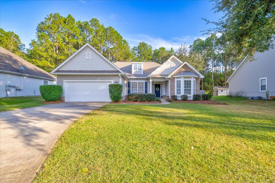 Motivated sellers - priced to sell fast! Also, owners are willing to have the interior painted (buyer can select color) prior to closing! Gorgeous home with plenty of space and privacy in an established community in the highly desirable Hammock Bay. This home features 4 bedrooms, 2.5 baths, and a split floor plan which boasts a large living room, recently updated eat-in kitchen including new cabinets and Quartz countertops, formal dining room, bar, and eat-in kitchen. There is a spacious primary bedroom with a lovely en suite boasting a garden tub, double vanity, walk-in shower, and separate water closet. The three guest rooms are also nicely sized and there are 1 full and 1 half guest bathrooms.