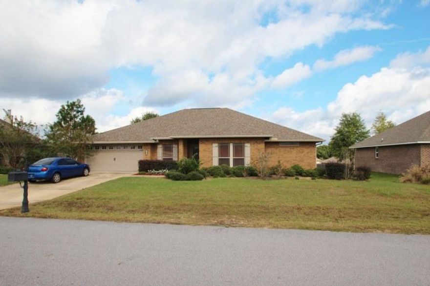 Great home in convenient location close to Antioch Rd. which is a quick connector to South Hwy. 85. This all brick home boasts a split bedroom design featuring 4 bedrooms, three full baths, and a bonus room that could be a guest suite, teen room, den, or study. This bonus room has it's own exterior door and patio as well! Master bath is awesome with ceiling shower and deep tub (see photo). Beautiful laminate flooring and ceramic tile throughout the home with carpeting only in the bedrooms. Gorgeous kitchen cabinets and all of the stainless steel appliances remain. Large living room and formal dining room plus informal dining area off of the kitchen. Nine foot ceilings throughout the home. All bedrooms are roomy and have walk in closets!