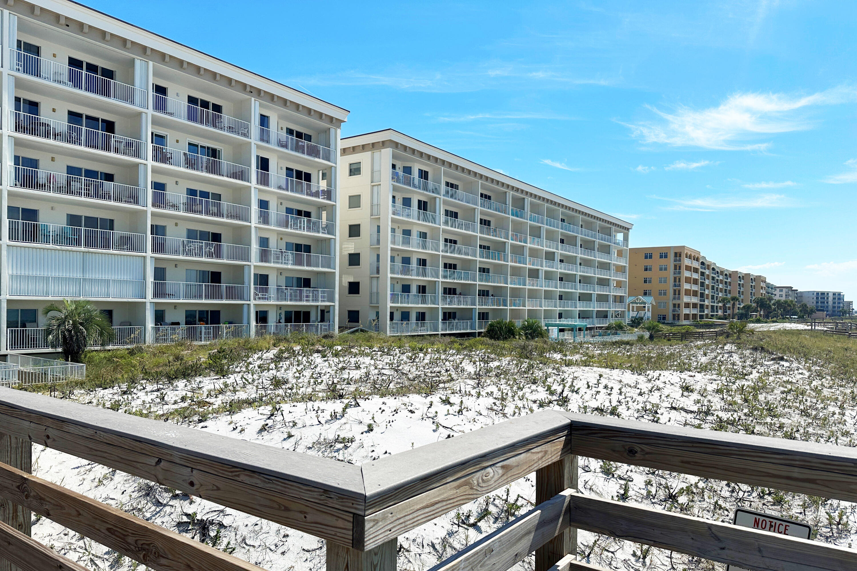 Directly on the beach with stunning views and sunsets. Second floor unit above parking garage and overlooking the beach and the pool. A strong vacation rental with gross annual rentals $45,000 to $54,000 over the past 4 years.This unit has been tastefully renovated to include new leather sleeper sofa with memory foam, granite kitchen counter tops, stainless appliances, all tile floors , crown molding in living area, beautiful tile backsplash in kitchen, and shows great! This floor plan is a proven winner with the built in bunks - sleeps six, and is always popular with vacation guests. The balcony overlooks the beach and has sturdy poly outdoor furniture including a glider loveseat. Amenities include two Gulf side heated swimming pools, tennis and an exercise room - and sugar white beaches Walk to the Okaloosa Island pier for restaurants and activities!
Includes one set of beach service / 2 chairs and umbrella until 10/31/2024 This condo comes with HURRICANE SHUTTERS on back patio. RENTAL MACHINE!
