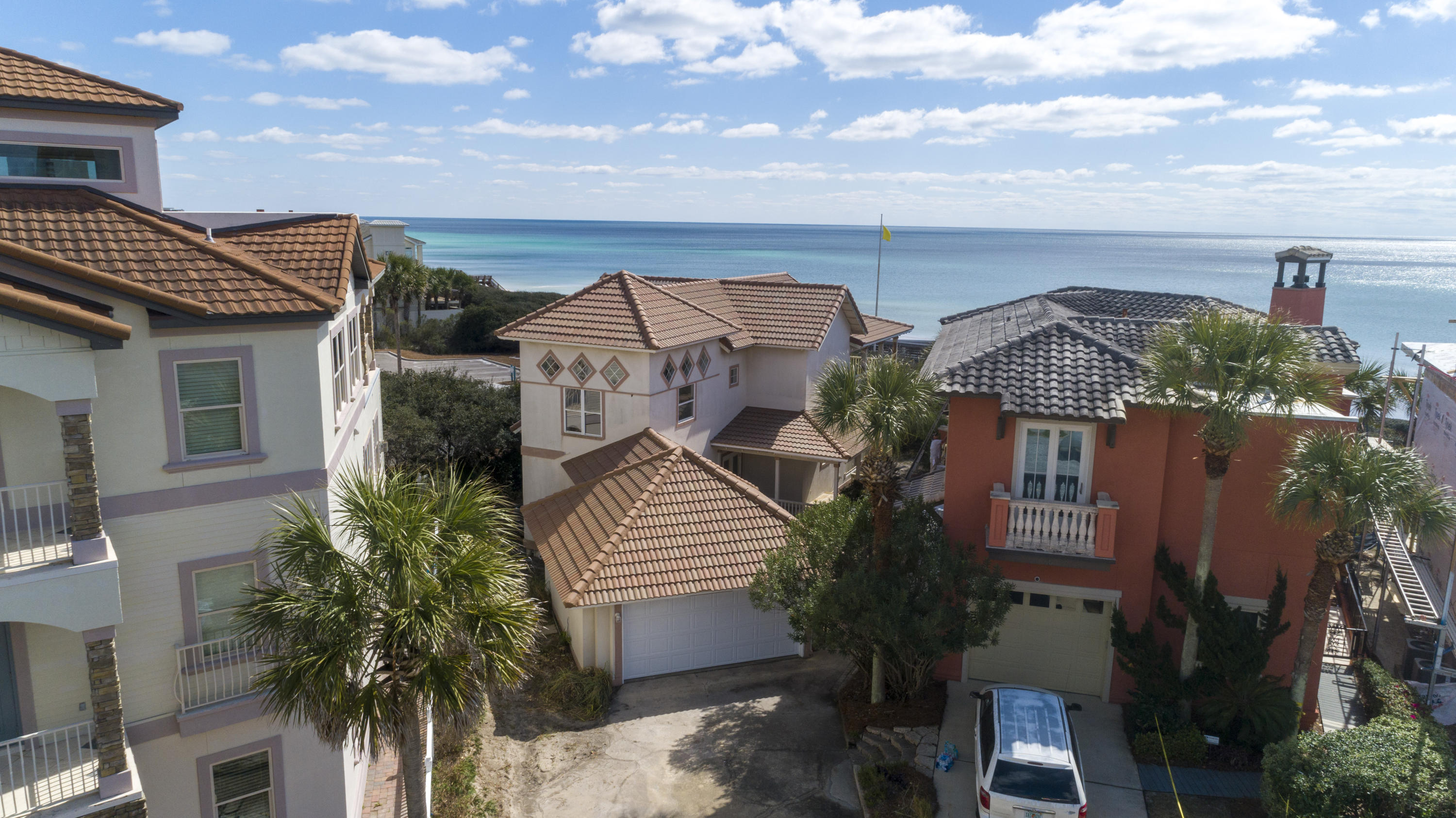 Attention Builders, Beach Lover's & Investors: Prime rehab or building site opportunity located directly on the beach and perfectly positioned on a 25 foot bluff overlooking a plethora of fine gulf villas and outskirt views of Destin & Panama City Beach. Tucked away in the highly desirable community of Seagrove Beach off of 30A, this is a must-see. This highly sought after location is one of the best opportunities on 30A with an exceptional layout to conclude a fabulous finished product as it boasts over half an acre, 55 feet of linear beach frontage and underground utilities. The east side of the property abuts the public beach access allowing for expansive and unobstructed gulf views to the east in addition to the immediate frontage.