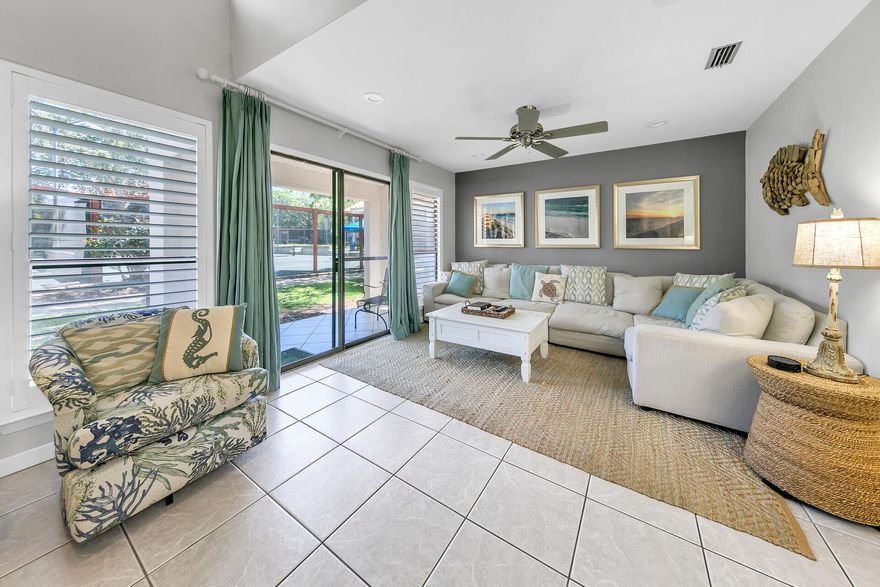 NEW UPDATES COMPLETED DECEMBER 2024!!  Brand new luxury vinyl plank flooring in both bedrooms and the stairway.  No carpet anywhere!  Both bedrooms have also been freshly painted, and include new rugs.  There is also a brand new chair, pillows and wall art in the primary bedroom.  Welcome to Tennis Village located in the private, gated community of Tops'l Beach Resort. This unit is being sold fully furnished and turnkey ready. The unit boasts two covered porches and a private, open air deck. As you head inside the property through the covered carport, you are greeted by the open living space of the kitchen, dining room, and living room. The kitchen has all stainless steel appliances and quartz countertops. There is no carpet to be found anywhere in the unit, providing for easy maintenance. Off the living room is the first covered porch with direct views of two of the 12 Rubico clay tennis courts. The setting must be seen to be believed! You will also find a half bath and owners closet on the first floor.

Headed up to the second floor soon you will discover BRAND NEW FLOORING AND PAINT! Luxury vinyl plank flooring has been installed and both bedrooms have been freshly painted. Both bedrooms upstairs have their own private bathrooms. The guest room located on the front of the unit has access to the private, open air deck, perfect for sunbathing, or just enjoying a little bit of privacy outside. The attached private bathroom has a shower/tub combo.
The primary suite located toward the back of the unit has access to the second covered porch overlooking the tennis courts. The master bathroom features a double vanity, and floor to ceiling tiled shower with sitting bench.

Being in the community of Tops'l Beach Resort, you have access to 600 feet of private beach, onsite rental management, world class tennis and fitness center with an indoor/outdoor pool, tram service to the beach, and onsite restaurant. Tops'l is located on the outskirts of Miramar Beach, only a short distance from dining and shopping at Silver Sands Outlet Mall, Grand Boulevard, Baytowne Wharf, and so much more.