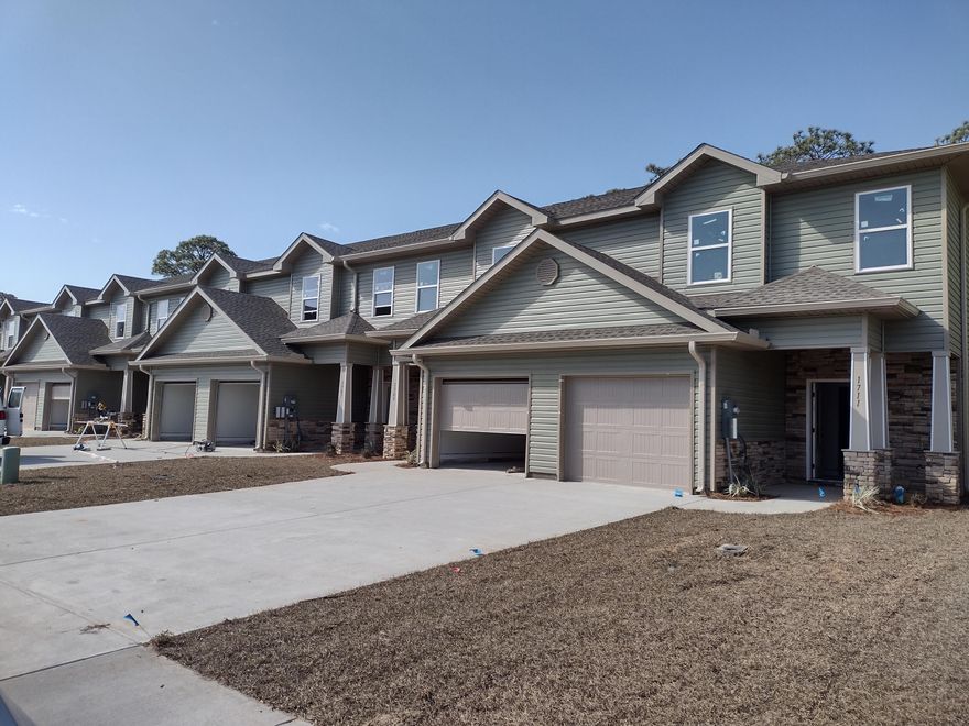 Last 15 units to be built in this Luxury craftsman style townhome community!! Built to the latest building and energy codes helps both on insurance as well as power bills. The location is a short distance to Hurlburt, as well as Gulf Breeze. Navarre Beach and Pensacola Beach are short drives as are shopping, and dining options. The home features 3 well sized bedrooms, 2 full bathrooms and a powder room is located conveniently on the main floor. The main floor features an open floor plan. The kitchen features granite countertops, and stainless appliances. Luxury vinyl plank flooring is throughout the home, so cleanup is easy. Upstairs the master suite is located to the back of the home with large walk in closet and double sink vanity. Estimated completion Jan 2023