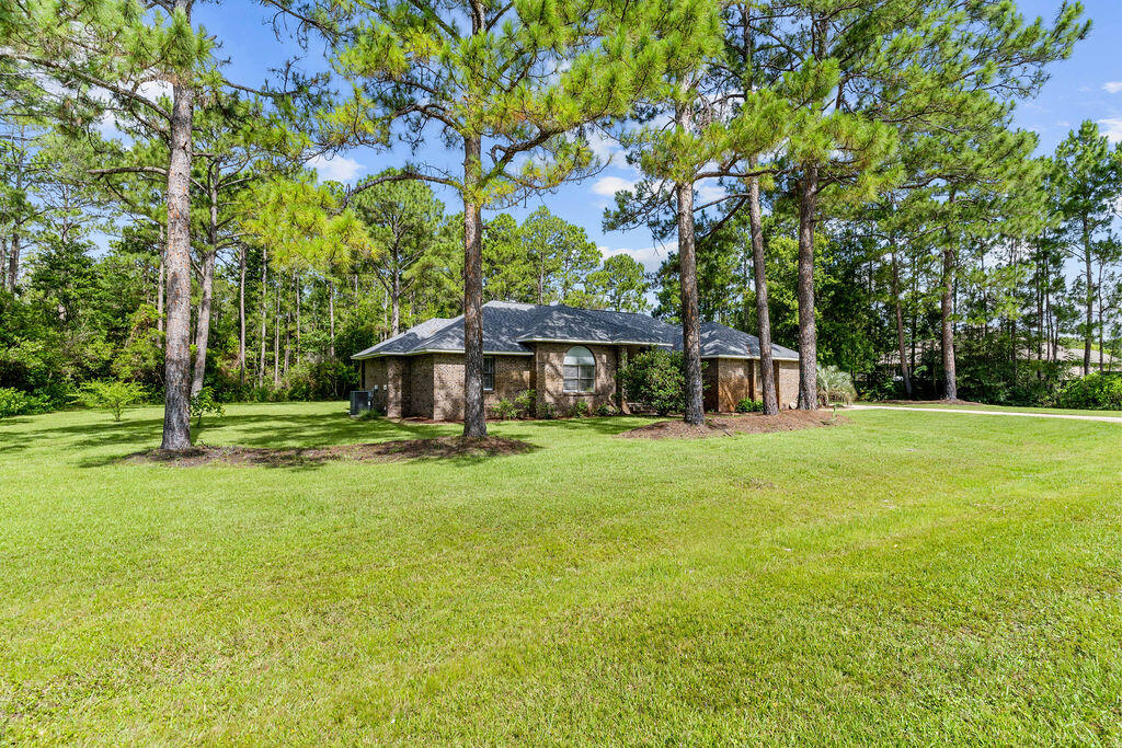 Charming 3-Bedroom, 2-Bath Brick Home on Secluded 0.70 Acre Lot!Nestled on a private lot, this beautiful 3-bedroom, 2-bath brick home offers a serene retreat with expansive outdoor space. Enjoy the peace and tranquility of the surrounding nature with 500 acres of federally protected wetlands adjacent to the property, providing added privacy and breathtaking views.The home boasts a cozy living room with a wood-burning fireplace, perfect for chilly evenings. Recent updates include new carpet & paint, the roof replaced in 2024, a water heater replaced in 2019, and both interior and exterior AC units replaced in 2020, ensuring comfort year-round. In 2022, a brand new septic system was installed, and the sprinkler system was fully upgraded with a new control box and all new piping. The exterior electrical panel was also replaced in 2022 and is now solar and generator ready. That same year, the overhead power lines were relocated underground from the street pole, enhancing both curb appeal and safety.
Holley by the Sea Amenities and Facilities:
Holley by the Sea offers a fantastic array of amenities designed for an active and enjoyable lifestyle! Residents and visitors can take advantage of the following:
Beach/Sound ACCESS AT COMMUNITY CENTER, PERFECT FOR LAUNCHING Kayak or fishing!
8 Clay Tennis Courts: Perfect for tennis enthusiasts, whether you're playing casually or competitively.
Beach House Event Hall: A beautiful venue ideal for gatherings, parties, and events with a scenic atmosphere.
RV & Tent Campground: With 10 RV back-in sites and 6 tent sites, it's an ideal spot for outdoor lovers and weekend getaways.
Lap Pool: For those who enjoy swimming laps or just relaxing in the water.
Family Pool & Baby Pool: Offering fun for all ages, including a dedicated baby pool for younger swimmers.
Full Weight Room & Cardio Machines: Stay fit with a fully equipped fitness center for strength training and cardio workouts.
Volleyball Court: Enjoy a friendly game of volleyball with family and friends.
Ball Field: A great space for sports, picnics, or recreational play.
Basketball Court: Perfect for a pick-up game or shooting hoops.
Youth Department: Offering before-and-after-school care and a fun-filled summer camp, perfect for families with children.
Whether you're looking to stay active, host a special event, or enjoy a relaxing day at the pool, Holley by the Sea has something for everyone!
Buyer to verify all dimensions exterior/interior!