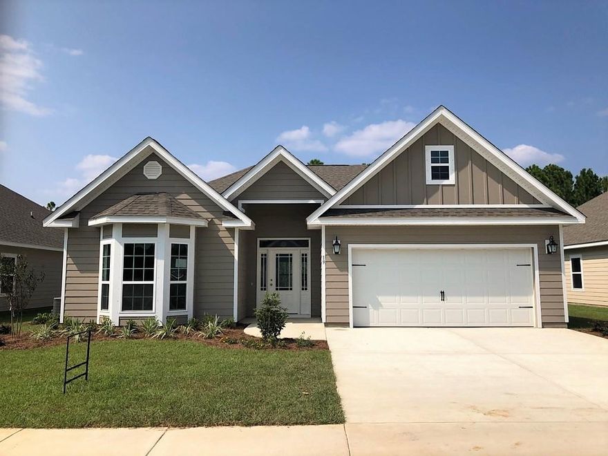 $7,500 in Closing costs with preferred lender! Don't miss this waterfront community in the heart of Santa Rosa Beach across from the west end of 30-A at an incredible value! Beautiful Ranch has wide foyer and open concept with tall tray ceilings which gives this home a very welcoming feel the moment you walk through the door. Open and bright kitchen with large island featuring storage and bar seating. The spacious dining area leads to a covered back porch where the home overlooks wooded conservation area for ultimate privacy. The guest bedrooms are split from the spacious master bedroom which showcase walk-in closet and ensuite master bathroom. Walk to our community pool or bike to the bay. Best new construction value on the beach. Community pool with showers and bathrooms now open!