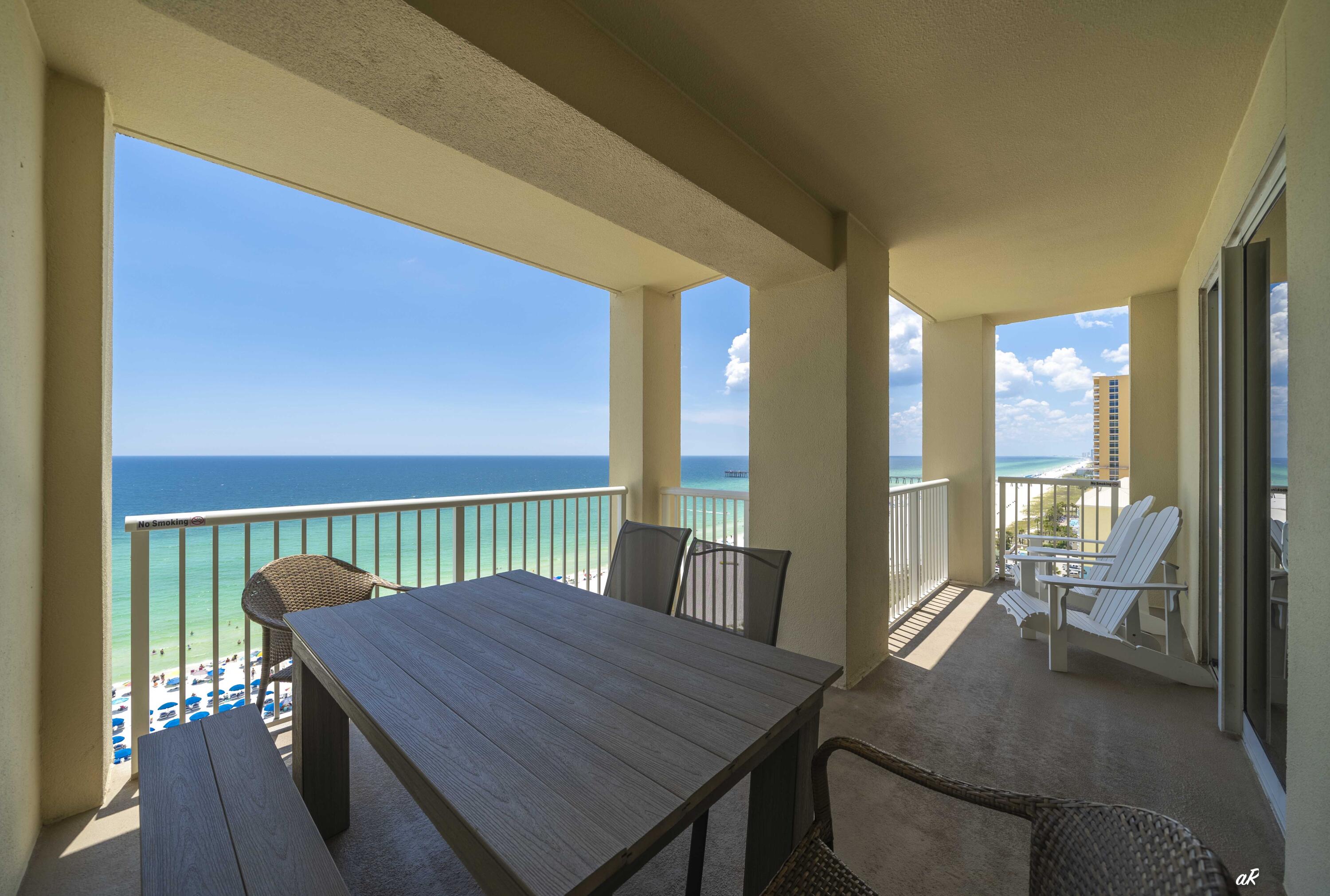 Experience the ultimate in coastal living with this gulf-front condominium at Grand Panama Beach Resort, situated in the heart of Panama City Beach, Florida. This three-bedroom, two-bath residence offers panoramic views from every room and features an expansive balcony overlooking tranquil green waters--perfect for enjoying both sunrise and sunset. The open-plan kitchen is equipped with stainless steel appliances and granite countertops, seamlessly connecting to the living area for optimal entertaining.The spacious primary suite boasts direct access to the Gulf-front balcony, an ensuite bathroom with dual vanities, a walk-in shower, and a soaking tub. The second bedroom also enjoys Gulf views and connects to a renovated guest bathroom featuring a large walk-in shower. Recent upgrades include a remodeled guest bathroom with new cabinetry, updated refrigerator and dishwasher, enhanced lighting, and a newer HVAC system.
Additional amenities include a dedicated storage closet rented for 2025, conveniently located just outside the unit for beach equipment. This property is offered fully furnished and is rental ready.
Grand Panama Beach Resort, one of the most sought-after resorts in Panama City Beach, offers 24-hour security services, two resort-style pools (one heated), a beachside tiki bar, a large fitness center, an onsite general store, a bistro restaurant, an owner's library, barbecue grills, and a level-5 walkway connecting Tower 2 to Tower 1. This meticulously maintained and updated condominium presents a unique opportunity to acquire your personal piece of paradise. Please schedule your private viewing today. While all information is deemed accurate, buyers should verify details that are of importance.
