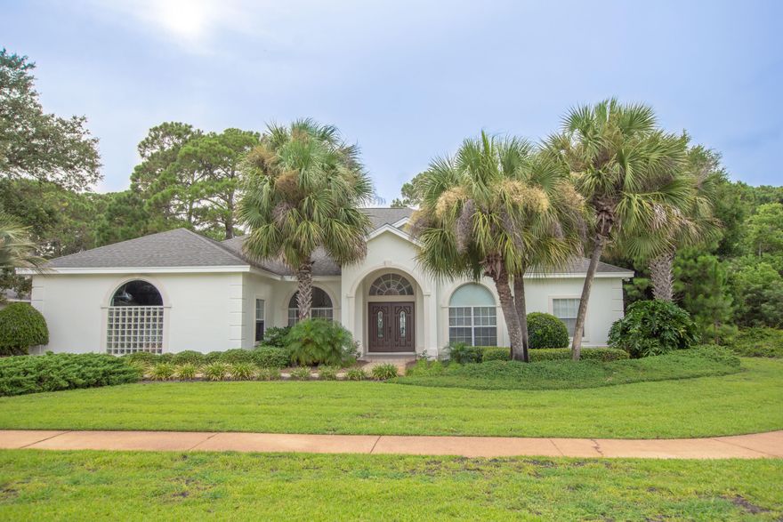 With 4 bedrooms + office, heated pool + lanai and a beautiful, private golf course lot, this newly painted exterior Indian Bayou home is what every buyer is looking for! This home features a beautiful Chef's kitchen with upgraded cabinetry, stainless steel appliances, pull out pantry shelving and solid surface counters. The spacious living room has beautiful built-ins, a gas fireplace and large patio doors that open to the pool and lanai overlooking the serene Indian Bayou golf course. The views are unbelievable! Flood zone X - less than $500 for annual policy!The stunning master suite opens to the heated pool and lanai and features wood look tile floors and a large master bath with soaker tub, separate shower, double sink vanities, make up counter and oversized walk-in closet. 3 additional bedrooms and 2 bathrooms are located on the opposite end of the home and have their own heating/cooling control for the ultimate in energy conservation!  This home also has a large dining room, home office/den and a large laundry/mud room that accesses the side loading garage with built-in cabinetry.  More upgrades include:  freshly painted May 2019, 10' soaring ceilings, storm shutters and Bahama shutters, and tile floors throughout except for 2 carpeted bedrooms.  Indian Bayou is a golf-course community nestled along the Choctawhatchee Bay that offers the best location in Destin - easy access to everything including Destin schools and residents can get a low cost parking pass at Henderson State Park for arguably the best beach just minutes away! Indian Bayou HOA fees are only $205/year and include security. Pet and smoke free home.  **buyer to verify all information including room measurements!**