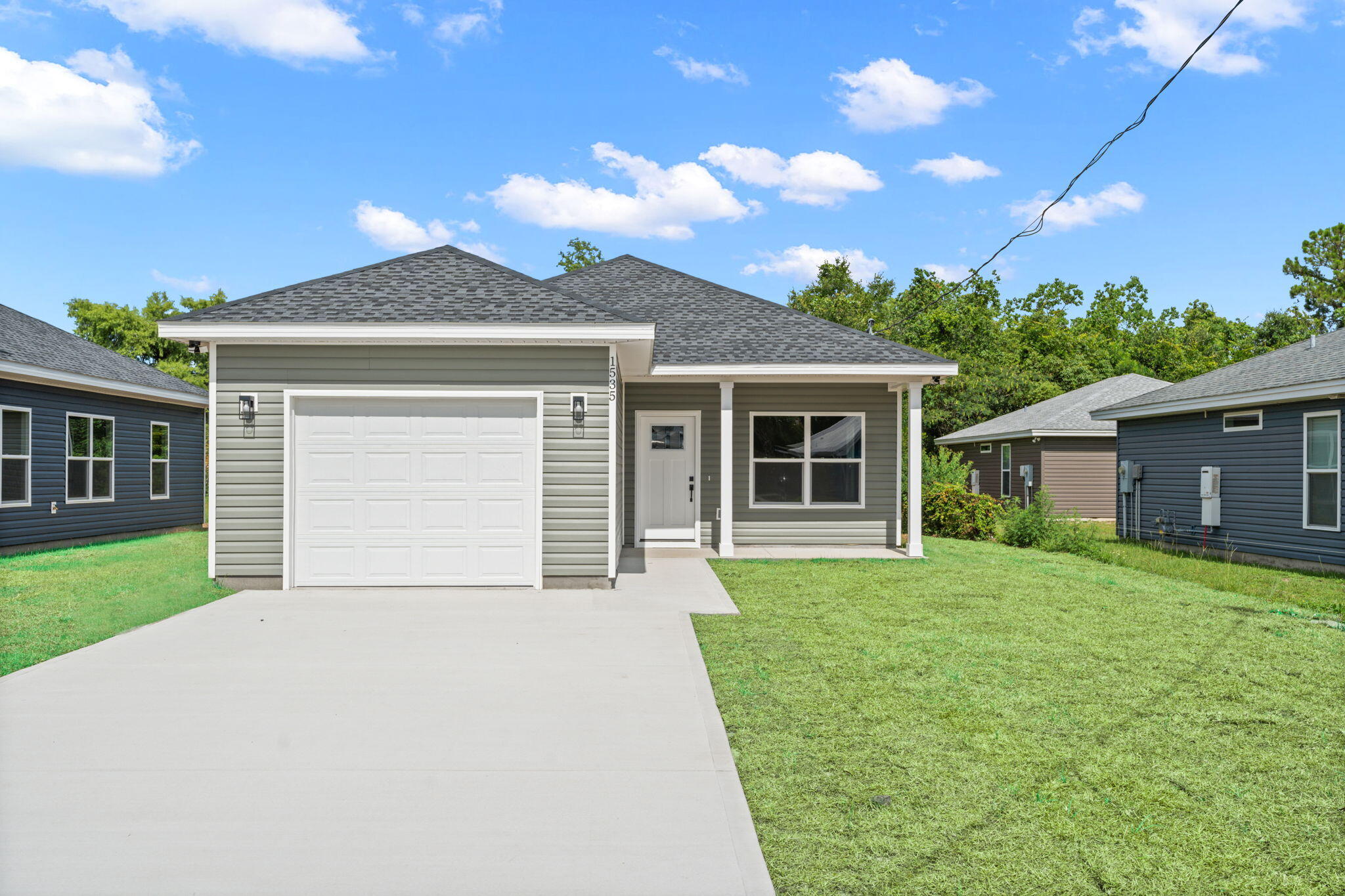 Looking for your dream home? This one has it all location, price, and beach proximity! Just off 15th Street, minutes from Walmart, Publix, and Target, and only 20 mins to the beach, 35 to the airport. Work, errands, and fun? All easy. And here's the best part: with a 1% down payment program, you can move in for just $2,900! This new Craftsman-style ranch offers 3 beds, 2 baths, an open layout, 1-car garage, and charming porches front and back. Nestled in an established neighborhood near top schools, shops, and medical care. Don't settle own a brand-new home in Panama City with low upfront costs. Schedule your tour now!