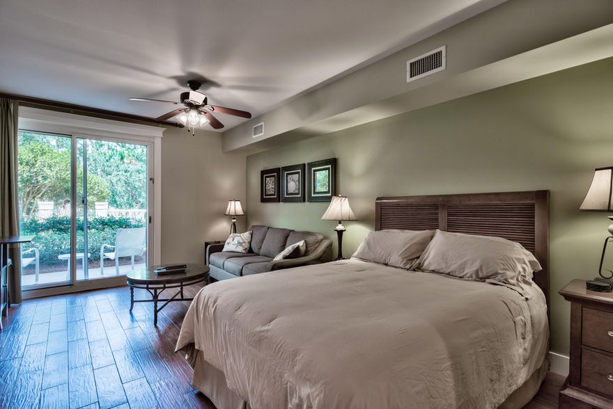 This beautiful 1st floor studio condominium in Lasata offers a large open patio overlooking the Grand Lawn. The open living/dining area is finished with porcelain wood tile for easy maintenance. There is a queen size sleeper sofa to accommodate extra guests in addition to the Queen size bed. The morning kitchen is complete with microwave, toaster, coffee maker, and refrigerator. New HVAC June 2017. Lasata owners enjoy the use of the large resort style lagoon pool and hot tub, fitness center, and the private Solstice Club.