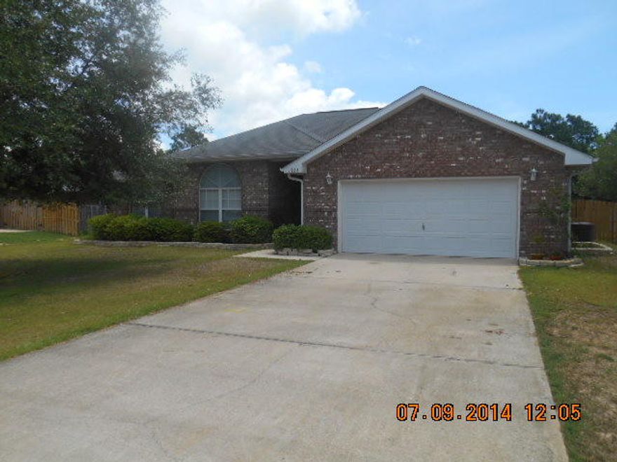 Beautiful all brick 3 bedroom home in Holley-by-the-Sea. Split bedroom floor plan. Large kitchen with lots of cabinets, breakfast bar with stainless appliances. Formal dining room. Large master bedroom with trey ceilings and large walk in closet. Dual vanities in master bath, garden tub with separate walk-in shower. Privacy fenced back yard with lawn pump and sprinkler system on well. Banana tree, a pomegranate tree and a papaya tree in the back yard. Small pet may be considered with owner approval and payment of a non-refundable pet fee. No smoking inside home or garage. Owner provides lawn care.