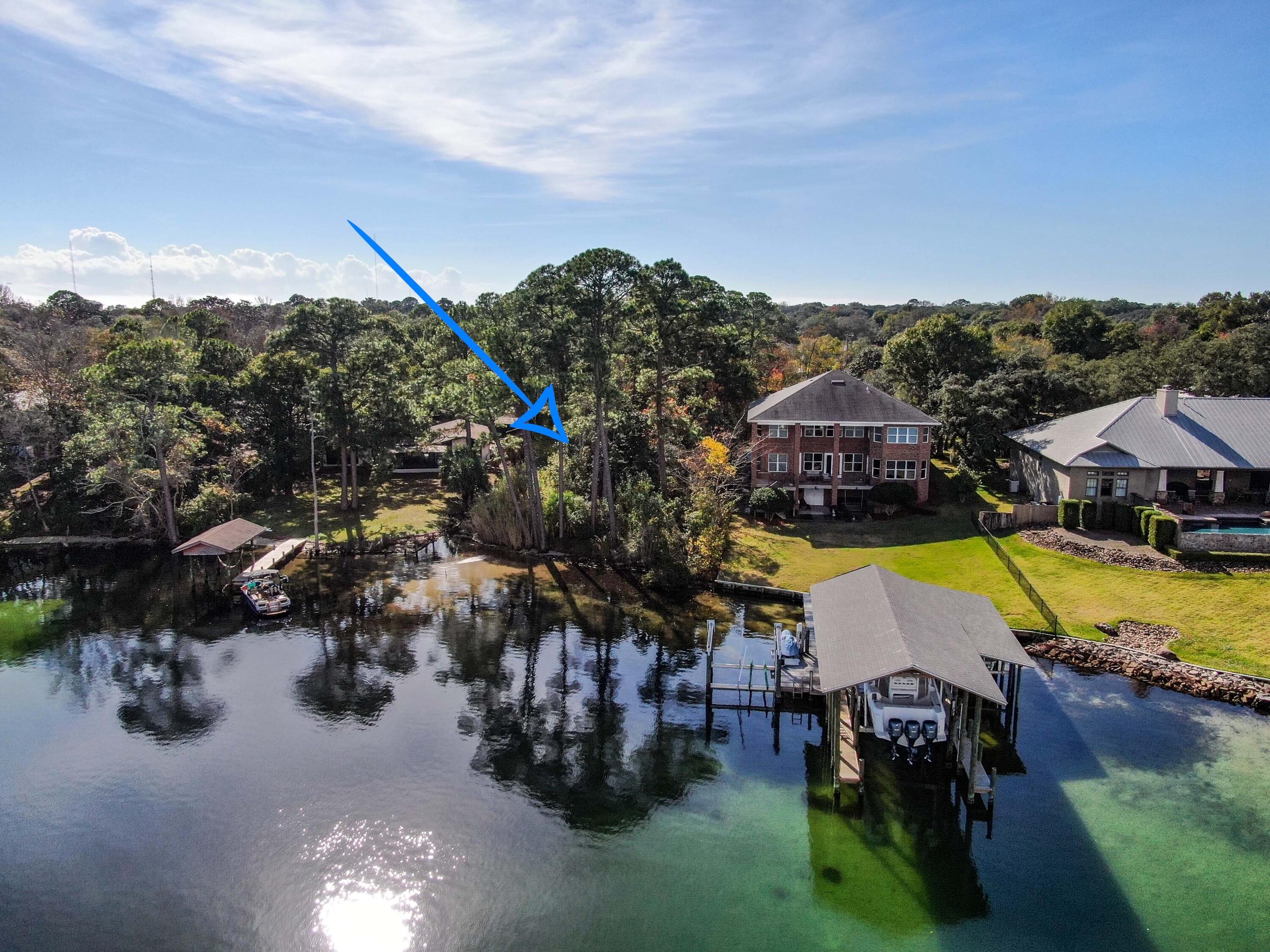 One of a kind waterfront lot in Ft Walton Beach. Approximately 72' of deepwater dockable waterfront with remarkable unobstructed views. This property is a boater's dream with a short boat ride to Crab Island, Destin Harbor, and the Gulf of Mexico. This lovely residential street features plenty of new construction luxury waterfront homes and is the perfect place to build your forever home with spectacular views of the highly coveted Cinco Bayou. Centrally located close to uptown station station with plenty of dining options and short drive to the beach. Buyer to verify all info