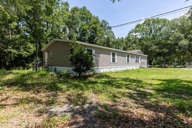 Fabulous Location - close to all South Walton has to offer. Large home with plenty of room for the family. The beaches of South Walton and Destin are just a 10 minute ride from this adorable home. Plenty of yard space for family and friends. Large laundry room, beautiful fireplace, kitchen and dining area. This is also just a short drive to Niceville, Panama City or Alabama. The home has all the comforts you need at a price you can afford. It is a must see in an area that has beautiful oak trees and is close to a flowing creek that is great for fishing. You will love the price and space of this place to call home.