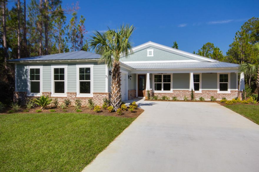 NEW CONSTRUCTION CUSTOM HOME- Unique coastal-craftsman style home makes luxury living affordable. Home exterior features include Hardiplank siding, irrigation system with well, exposed rafter tails, metal roof, tongue and groove stained porch ceilings, and professional landscaping, The interior boasts upgraded lighting, granite counters, solid maple cabinet doors, solid wood doors, hardwood and travertine floors in the main living areas and bathrooms, also impact windows. Close by is a community pool and amazing amenities center which includes tennis, pickleball, and basketball courts. Bear Creek is a desirable community in Freeport, that is within minutes to the beaches of South Walton, Scenic Highway 30a, Choctawhatchee Bay, a county boat launch, fishing pier and water front county park