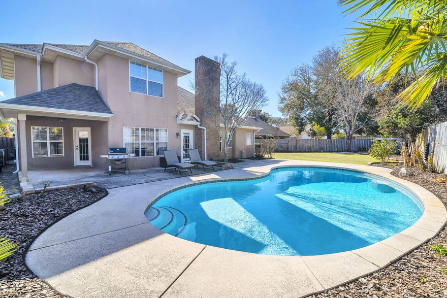 BACK ON MARKET W/ GORGEOUS NEWLY PLASTERED IN-GROUND POOL!  Welcome to your dream home w/large, lush private backyard in gated community. Combining comfort & style, step inside to a bright, open Great rm w/a cozy gas fireplace--perfect for relaxing evenings. The large eat-in kitchen is a chef's delight, featuring Corian counters, SS appliances & oversized eating bar.  Ideal for entertaining, a separate formal dining area, is close by.  The 1st fl master suite w/tray ceiling is a true retreat, offering abundant space for a sitting area or office. The en suite bathroom boasts dual sinks, a jetted soaking tub & a walk-in shower for a spa-like experience. Upstairs, you'll find 3 add'l BR's, including 1 extra large one, designed w/comfort & flexibility in mind. Outside, relax & unwind in you private oasis with gorgeous NEWLY RE-PLASTERED in-ground pool & NEW sand filter surrounded by a lush backyard with plenty of space for play or relaxation. The covered patio provides respite from the sun, and an ideal space to entertain guests and/or enjoy your morning coffee.  

This home also comes with valuable updates including a 1-year-old roof, 1-year-old hot water heater, and a 7-year HVAC system, ensuring affordable insurance peace of mind for years to come.  

Other features include laundry room w/washer & dryer, Boze surround sound in the Great room, abundant closets & storage, large attic, exterior storage shed, sprinkler system with well,  generator hook-up, and recently re-sealed windows, 

Centrally located, you're just minutes from top-rated schools, shopping, dining, and both military basesmaking this home as practical as it is beautiful.

Don't miss your chance to own this incredible Home. Schedule your private tour today!