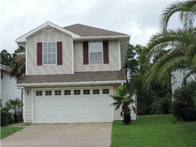This is a really great 3 bedroom, 2.5 bath lake front home in the heart of Destin. The home features ceramic tile, vaulted ceilings, brand new carpet and kitchen countertops and fresh paint. Don't miss this one!! Property being sold ''AS IS'' with right to inspect. Purchase this property for as little as 3% down.