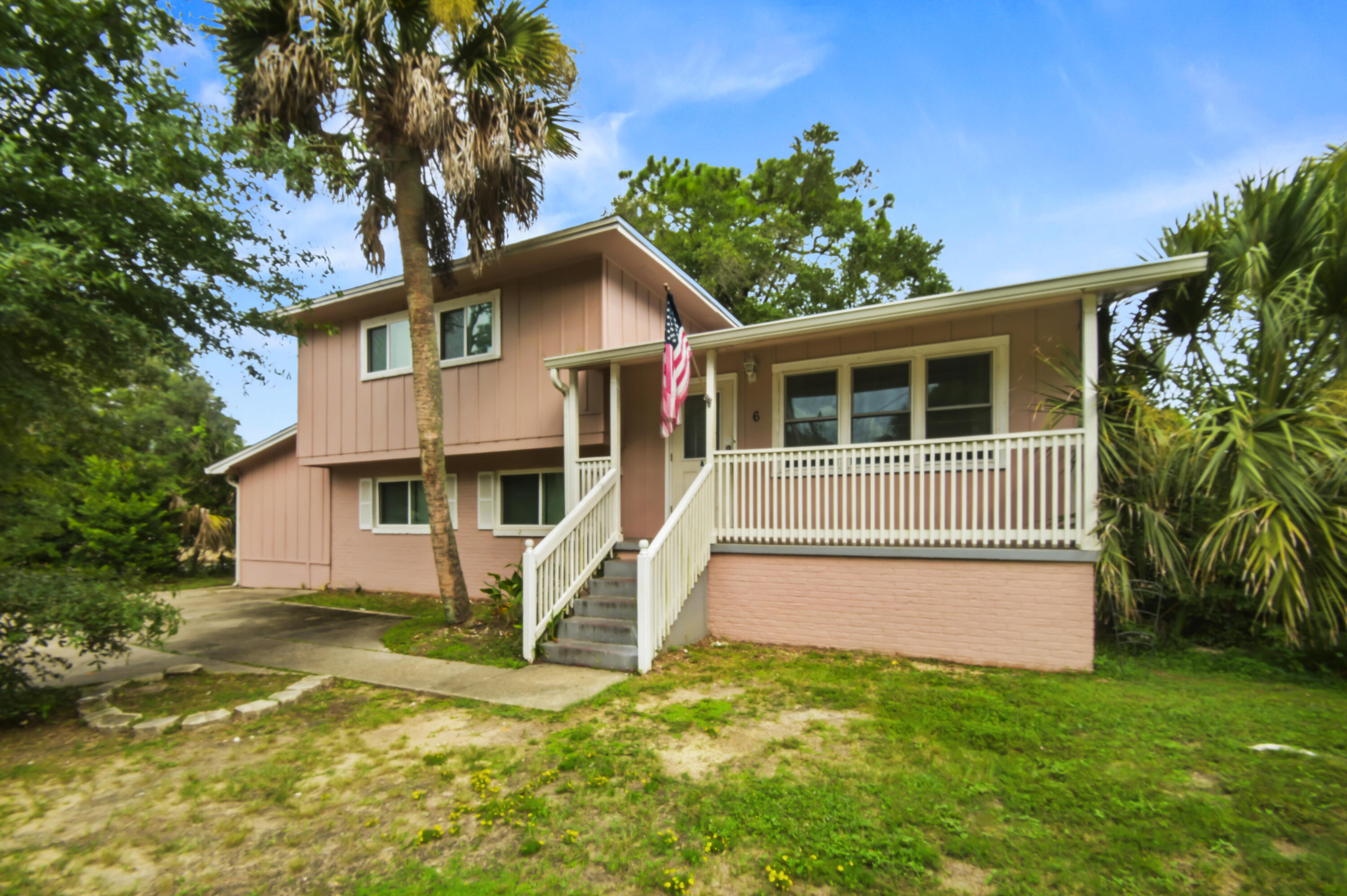 This updated home is truly shocking with its perfect use of space! With 5 massive bedrooms, each with its own dedicated bathroom, this home is a dream for those with large families, investors, and those who often entertain guests. Located just north of East Hill, this home is located on cul-de-sac in a small neighborhood with quick access to downtown, the airport, the mall, and famous beaches. Stepping inside you are greeted by a split floorplan, providing ample privacy to the bedrooms. The kitchen overlooks the backyard and features stainless steel appliances, a breakfast area, and granite countertops. Downstairs, the living area is massive, combining the dining and living areas seamlessly. This room features a fireplace, perfect for warming up on a cold NW Florida night. Four of the bedrooms have en-suite full bathrooms and can easily accommodate a king beds. The remaining bedroom can be used for an office or a guest room with room for a queen bed, and has a bathroom in the hallway. The crown jewel of this house is the attached in-law suite/ADU with its own full bathroom, kitchenette, and private entrance. The outdoor space is fantastic with a covered front porch, a wooden deck, and a large backyard. Whether you want to use this house as an investment property, a primary residence, or a mix of both, you NEED to stop on by and check it out! 2020 ROOF, 2023 HVAC, 2024 paint, hurricane windows, updated wiring, and 2024 flooring (NO CARPET THROUGHOUT!). STR/Rental/Investment/Airbnb income was $60k in 2023 and 48k in 2024.