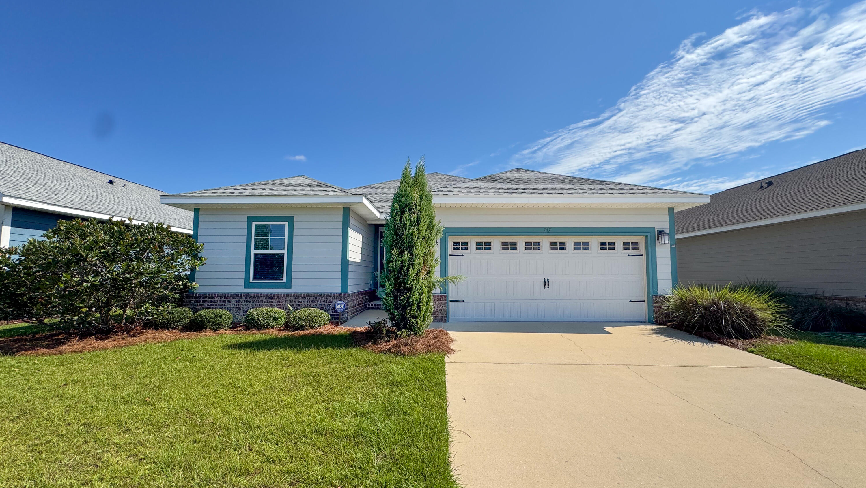 Discover this like-new Craftsman cottage nestled in the serene gated community of Lafayette Creek Landing, just a minute away from Publix and a short drive to the stunning Santa Rosa Beach. This 3-bedroom, 2-bathroom home offers modern living with thoughtful features like 9-foot ceilings, an inviting 8-foot entry door, and durable vinyl plank flooring throughout. The kitchen and bathrooms are accented with Moen faucets and stylish lever-handled hardware. Step outside and enjoy the peaceful surroundings or take advantage of the community pool. Plus, the convenience of a 2-car garage equipped with a door opener. Schedule your showing today!