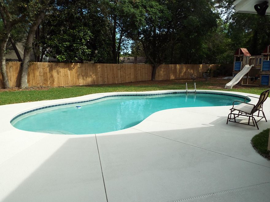 AMAZING OPEN AND BRIGHT Bluewater Bay POOL home situated on a large, private cul-d-sac lot!!! Perfect Staycation home, updated kitchen with granite, stainless steel appliances (convection oven), new hardwood, tile and carpet throughout! Beautiful travertine surround fireplace and an enclosed sunroom/bonus room that overlooks the pool! In 2018 a new a/c unit, well and pump for sprinkler, and Dolphin Premier Maytronics pool cleaning robot; In 2017 all new flooring, privacy fence, pool pump, garage door and opener, custom built shed on slab; and in 2016 new windows and fabric hurricane shutters, This home is wired for security with Cox, has a transferrable termite bond and offers a home warranty. It's been newly painted and is ready to welcome you home!!! A MUST SEE!!! Won't last long!