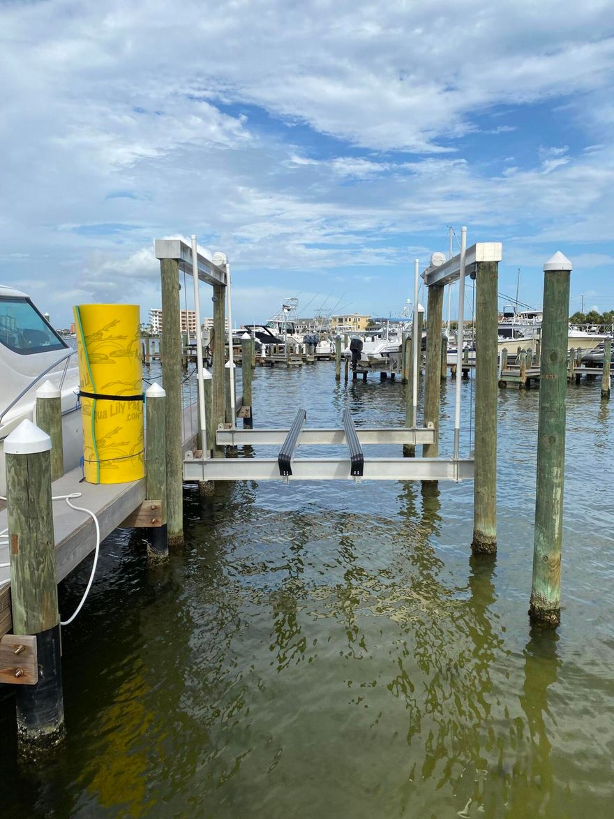 East Pass Towers marina is a great location in the Destin Harbor. Dock C is the last dock on the right as you enter the main gate. The slip has a 16,000 lb. capacity aluminum top mount boat lift- fits a 35' center console. The marina offers a gated entry for security & privacy, fish cleaning, pump station, electric service, cable, phone, and water. Buyer should verify any and all information including dimensions, boat slip & lift.