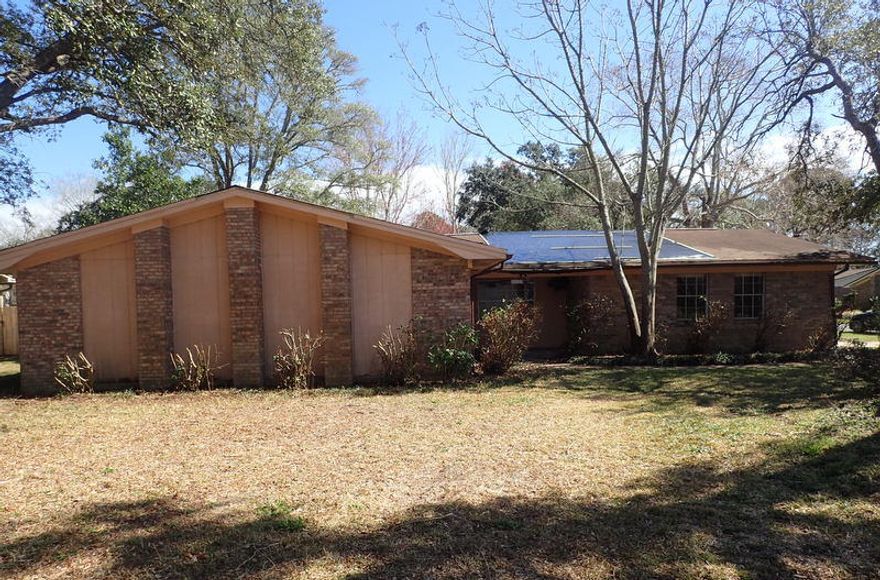 Looking for location and potential, then this 1800+ square foot REO home is one to put on the list. Built in 1980 and on a corner lot, this all brick side entry garage home has privacy fenced back yard, large laundry room and galley kitchen. You will find a living room with fireplace and family as well as 3 bedrooms and 2 baths. This property is all about potential so open minds required. Call today!