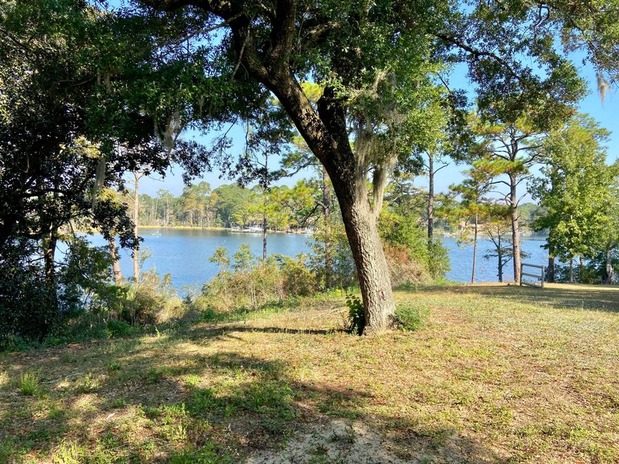 Remarks: Rare opportunity awaits with this stunning WATERFRONT lot nestled on the back end of Tom's Bayou. This LARGE property is a hidden gem with a peaceful view and surrounded by vacant government land. Recommend tearing down the house on the waterfront to make room for your beautiful new home. Seller is a builder and available should you desire to have him build your dream home. Enjoy the freedom of building without constraints of an HOA. This property can also be divided into 3 separate buildable large lots, previously set up for a PUD or family compound. Another option is to renovate the 4 bedroom, 2.5 bath home that is already there. The potential is limitless