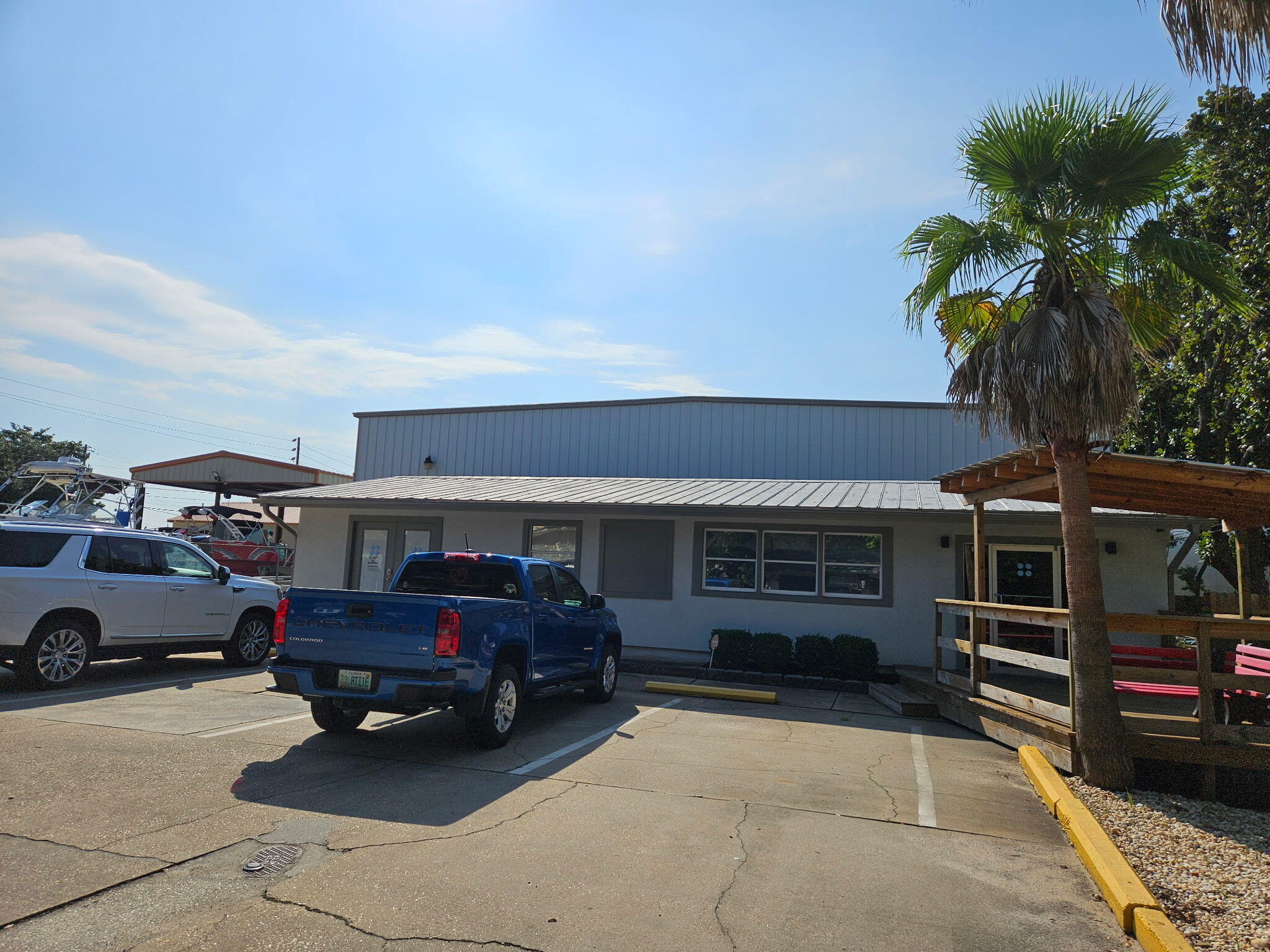 Spacious 6,100 sq. ft. building offering 5,000 sq. ft. of open warehouse plus 1,100 sq. ft. of modern office space --3 roll up bay doors ideal for a wide range of business uses.