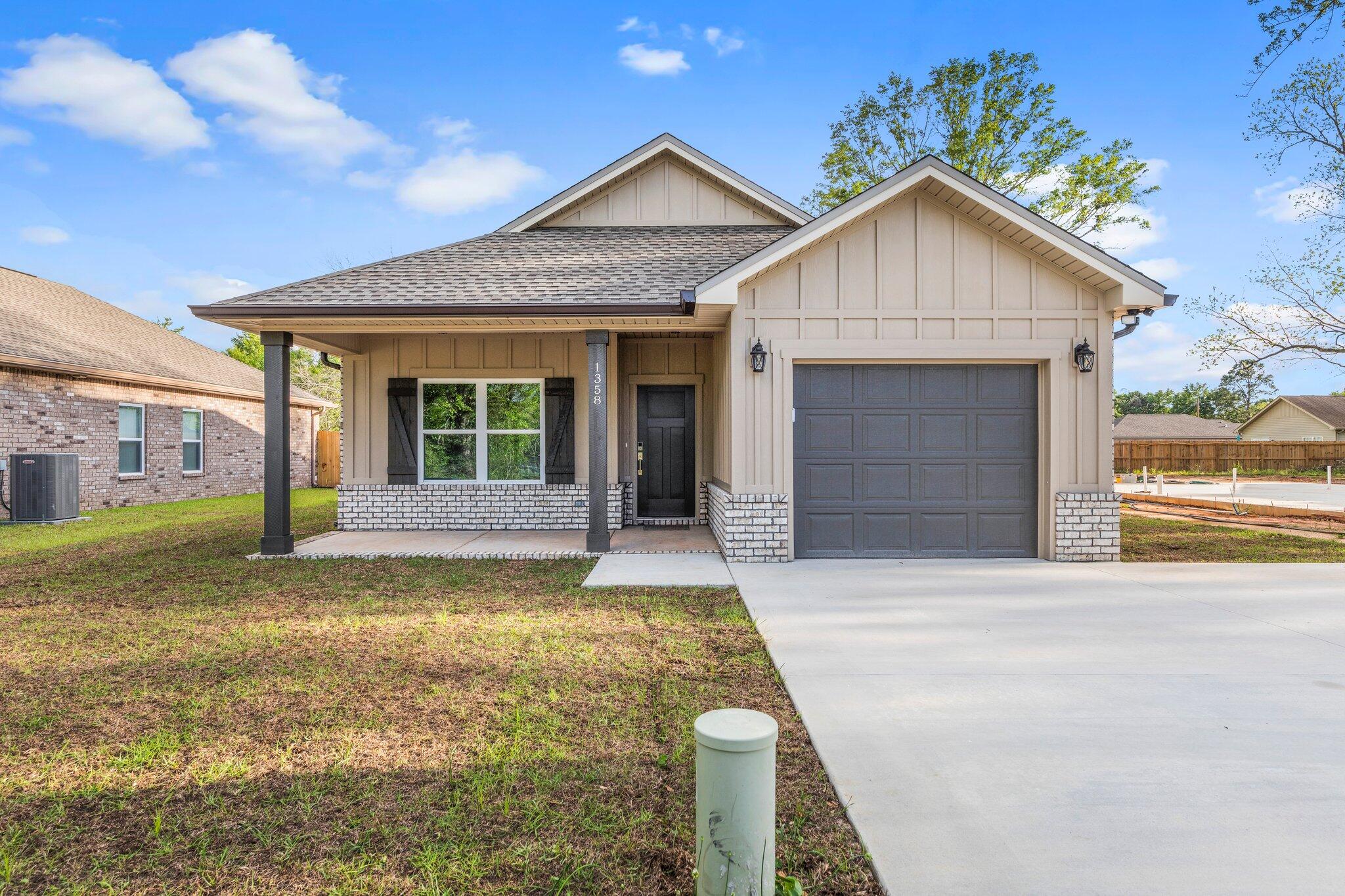 New construction completed! This home is the perfect blend of elegance and modern design, with an open floor plan and split bedroom layout creating an inviting ambiance, perfect for entertaining guests.  The kitchen features white shaker cabinets with soft close doors, a large island with extra storage space, and granite countertops that encase a stylish farm sink. The stainless steel appliances add a touch of elegance. The rest of the home boasts luxury vinyl plank flooring in all living & wet areas, and cozy carpet in the bedrooms. Finalized with a finished garage, gutters, and a privacy fence. Extra concrete has been poured for additional parking! Builder will pay $6,500 toward all cc with preferred lender. ***Buyer is responsible for verifying measurements.