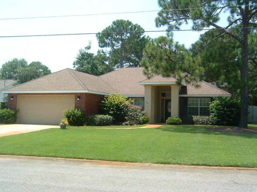 $ $ Lowered from $269,500 ! $ $ Perfect location, a block from Bay with community pool and dock on Bay * *New laminate flooring in large 16 x 33 great room area and hallways, and new carpet in bedrooms * * Painted all sheetrock, ceilngs, trim, doors * 2 new ceiling fans & yard recently sodded* * **Split bedrooms with large master bedroom 12x19, and 6x6 walk in closet and 8 x 14 bath with separate shower and whirlpool tub * * New stove/oven/microwave * * Wood Burning Fireplace * Vaulted Ceiling * Separate laundry room * Double doors to back patio with pergola and privacy fencing ** BUYER VERIFY DIMENSIONS/INFO * AS IS WITH RIGHT TO INSPECT, seller not aware of any issues, has never lived in house **