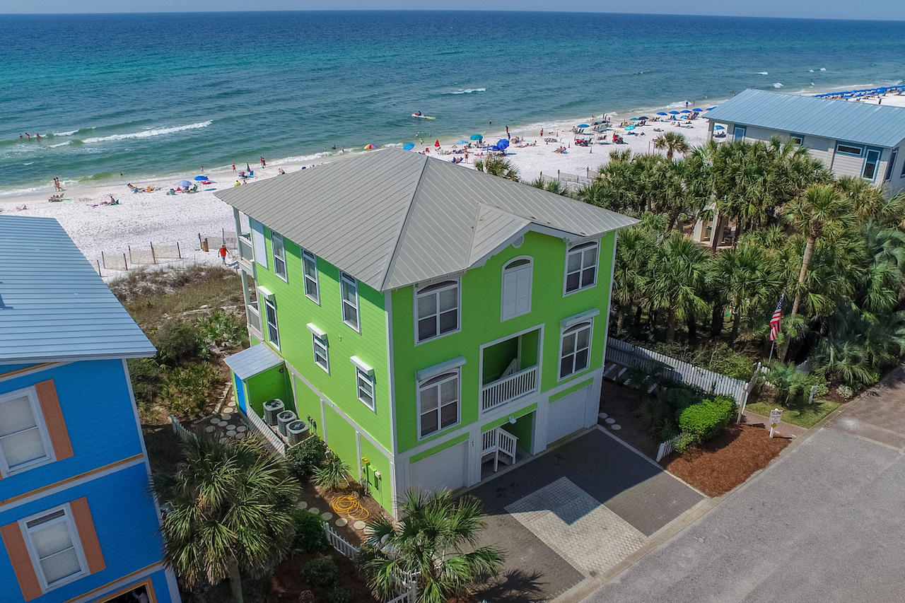 PRICED TO SELL ASAP!! Three-story home directly on the Gulf in the private family-friendly community of Sunrise Beach just steps from Ed Walline Park and a short walk to Gulf Place on 30A! Enjoy great sea views from full-length balconies and the home's many huge windows. The kitchen features a bay window, stainless appliances, and breakfast bar, while the open floor plan is great for entertaining. The home is currently furnished as a vacation rental: in addition to the large master suite, there are 2 additional bedrooms on the 3rd floor, a small bunk room on the main floor, and a huge bunk room on the first floor.