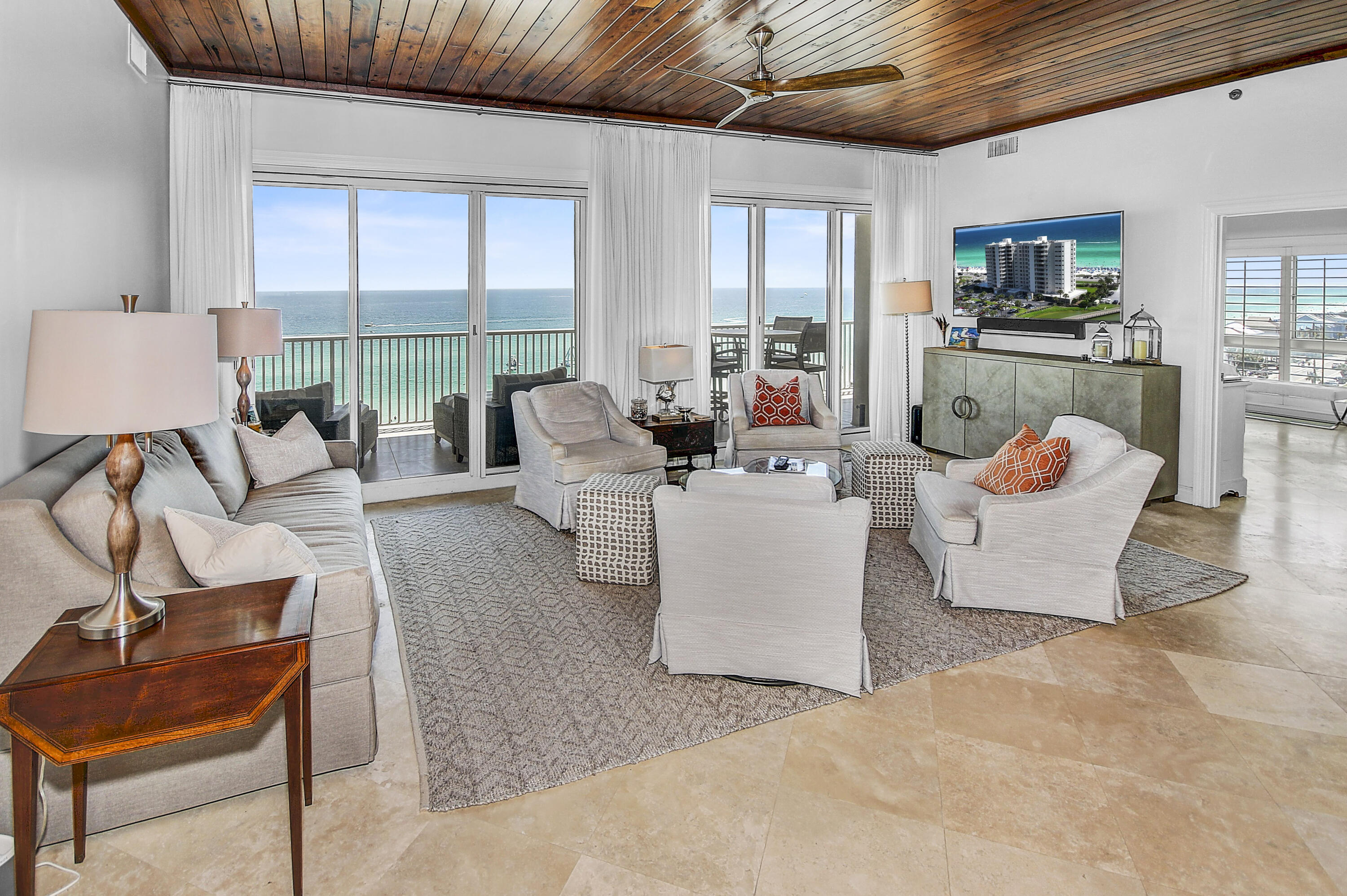 Enjoy unobstructed gulf views from this beautifully remodeled, very spacious residence at the Empress. This perfectly situated 9th floor condominium is located on the highly coveted west end of the building and features the finest finishes and the latest in design and furnishings. It's a must see, as the owners have meticulously maintained this special offering and have elevated it throughout with improvements such as a pecky cypress foyer ceiling and pecky cypress fireplace mantle, tongue and groove ceilings in the bedrooms, quartzite and granite countertops in the kitchen and bar, top of the line kitchen appliances, double ovens, a warming drawer, travertine flooring, and new HVAC systems in 2021. The spacious master suite features it's own expansive gulf views with balcony access,