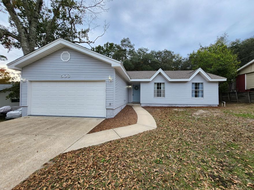 Welcome to this charming 3-bedroom, 2-bathroom home located in the vibrant city of Niceville! This house offers a range of amenities to enhance your living experience. Step into the modern kitchen equipped with stainless steel appliances, including a dishwasher and a gas range, perfect for preparing delicious meals. The washer/dryer hook-ups provide convenience and ease for your laundry needs. Enjoy the fresh and cozy atmosphere with new carpet and fresh paint throughout the house. The new roof ensures durability and protection for years to come. Gather around the fireplace in the living room during cooler evenings, creating a cozy and intimate setting.