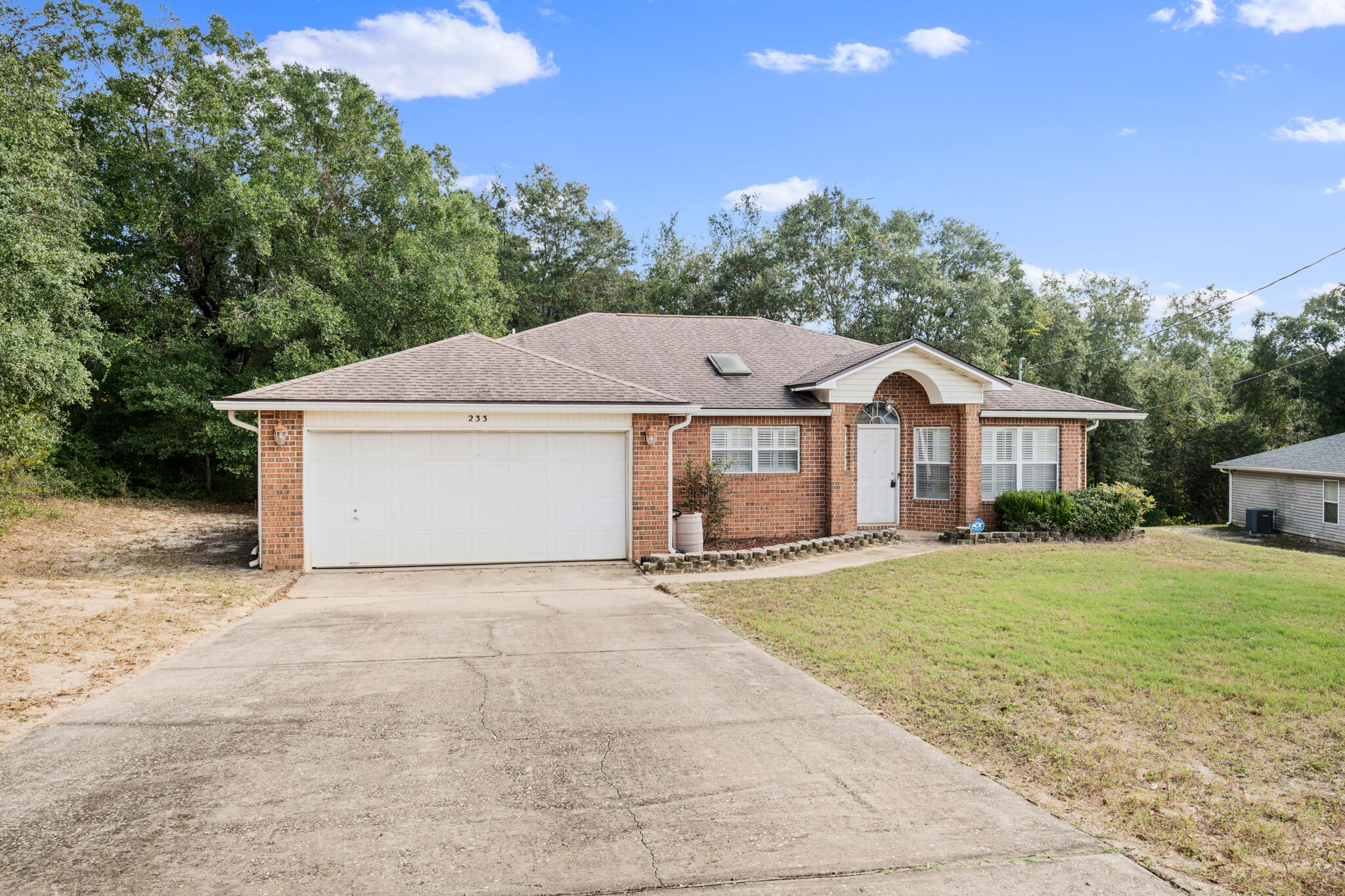 Paid off Solar Panels! Charming 3-bedroom ,2-bathroom home with a flex room. Located South Crestview, its minutes from Eglin Air Force Base, shopping, and beaches. Enjoy wood tile flooring throughout the main areas, with carpet in bedrooms. Key features include a 2015 roof, and a geothermal HVAC system. Plantation shutters add elegance and privacy. This home is perfect for those looking to create their dream space in a highly desirable location.