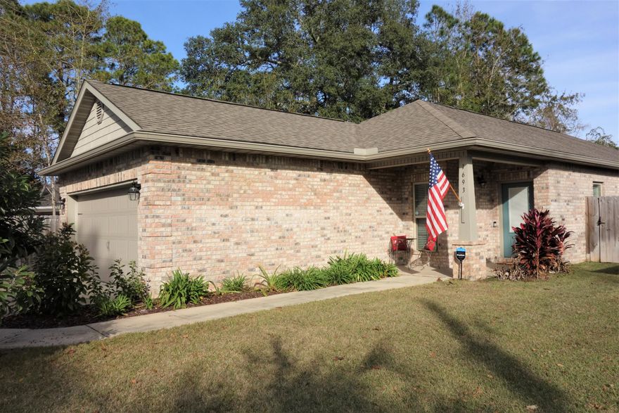 Like new fantastic 4-bedroom 2 bath house built in 2017 in Bluewater.  Open concept but split floorplan for maximum privacy.  The kitchen has soft close, wood cabinets with rubbed bronze hardware, subway tiled backsplash, slate finished GE appliances that include refrigerator, stove, and microwave, and granite countertops.  Durable vinyl plank flooring throughout the house.  5'' baseboards and deluxe colonial casing on doors as well as 5'' crown molding in the kitchen, family room, dining room, and foyer.  A screened in back porch leads to the fully fenced backyard complete with irrigation, pergola and a yard shed - the perfect place for your yard equipment, toys, and oversized items. Additional features include: termite bond, gutters, oversized concrete driveway